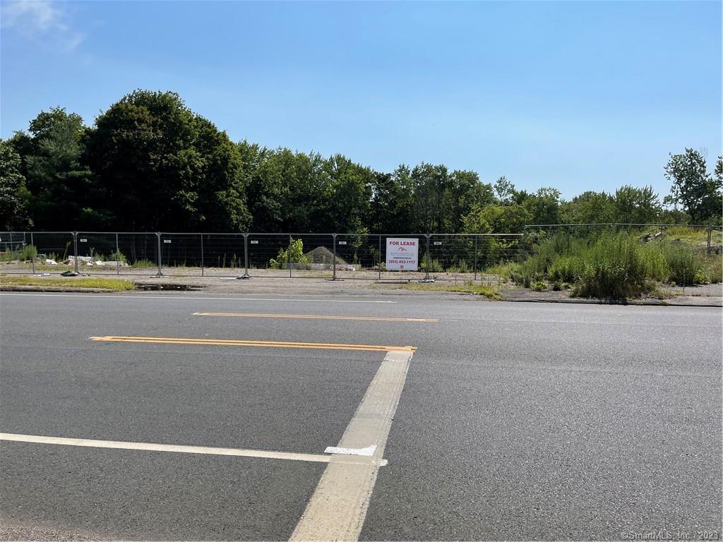 The subject property is a land lease of about 1 acre with about 200 feet of road frontage on the east side of South Broad St(US RT 5) at the intersection of Hall Avenue. 2019 CT DOT Traffic count was 7, 000 ADT (during COVID). This is a signalized entrance on South Broad St. Site plan Available. Next to Dunkin,  Car dealerships and dense retail just to the south. Owner will also entertain build to suit.