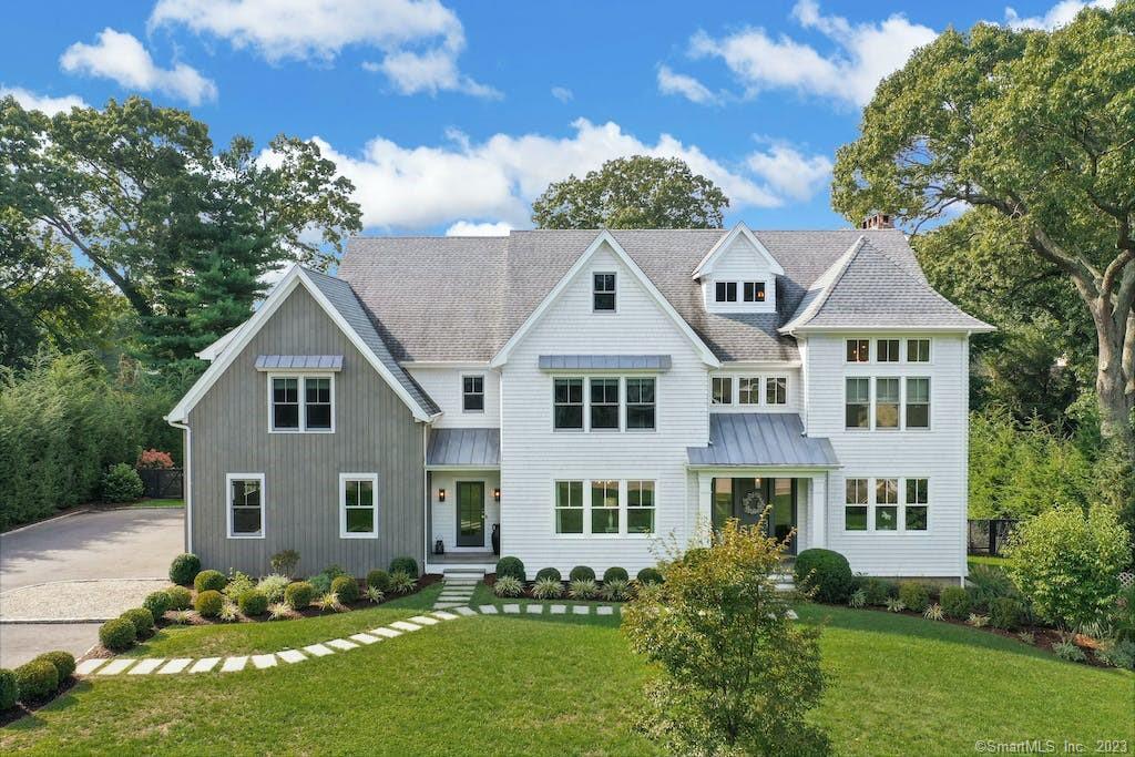 Built in 2018, this thoughtfully designed modern colonial is situated on a level 0.66 acre on a private cul-de-sac in a sought after Westport neighborhood. The home has 7,122 sq.ft. of living space on four levels; six bedrooms, six full & two half bathrooms. The foyer leads to the living room with gas fireplace and to the formal dining room. Two built-in bar areas make entertaining a breeze. The gourmet kitchen, breakfast area and family room with fireplace create the heart of the home. The kitchen boasts custom cabinetry, a large island with waterfall edge, Wolf ovens and gas cook top, sub-zero, two refrigerator drawers and a walk-in pantry. The mud room, an office and two half baths complete the first floor. Upstairs features a stunning primary bedroom suite w/fabulous marble bathroom & spacious walk in closet; four more bedrooms -- two are en-suite and two are Jack & Jill -- plus a hallway computer nook. The third floor is partly finished and offers a playroom, a bedroom & a full bath. The lower level has a great room w/fireplace, a bright bonus room and a gym. Enjoy the serene backyard oasis; relax or entertain on the large blue stone patio or the inviting covered porch -- overlooking the gunite pool w/spa. Welcoming & intentional, this home exudes quality and pride of ownership. Walk to Saugatuck train station and a medley of restaurants & shops. Launch your SUP or kayak at the private street boat ramp and dock for paddles on the Saugatuck River. A fantastic location.