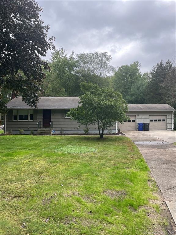 Adorable 2 bedroom ranch with large 2 car garage. Front to back living room, hardwood floors through out. Nice sunroom overlooking private backyard. Subject to probate approval.