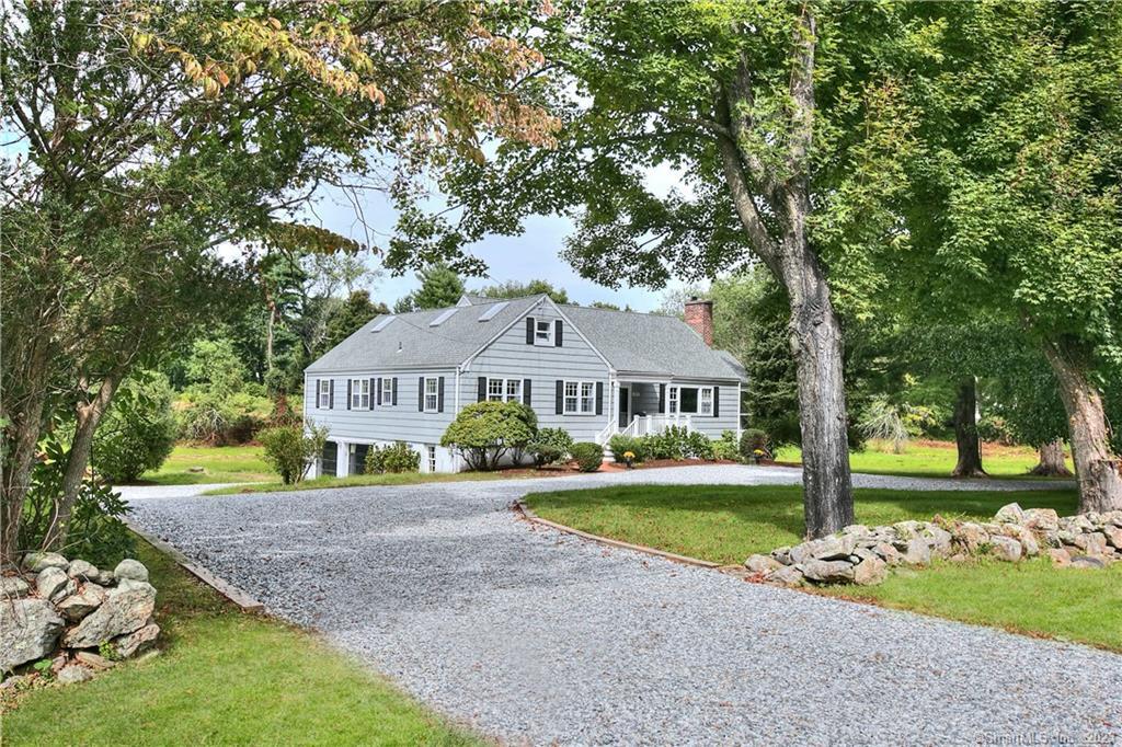 Unique opportunity in coveted Greens Farms. Privacy plus convenience can be enjoyed at this delightful Cape/Farmhouse with three levels of living space including a walk out lower level sited on almost 2.7 acres. Welcoming screened porch overlooks an expansive yard. Main floor primary suite includes a walk-in closet, updated bath with double sinks, soaking tub, & separate shower. First floor also features: family bedrooms, office, living room with fireplace, updated kitchen with stainless appliances & dining room leading to porch with pretty views of the grounds and flowering meadows. Large lower level with mudroom area, full bath, family room with fireplace leading to a stone patio. Attached 2 car garage, circular driveway and ample parking areas. Overall good floor plan for easy expansion. Incomparable location: .7 mile to the beach, .8 miles to the train, near designated open space and lifestyle amenities. Enjoy a dream life adjacent to multi-million homes and estates. Survey available, AAA zone.