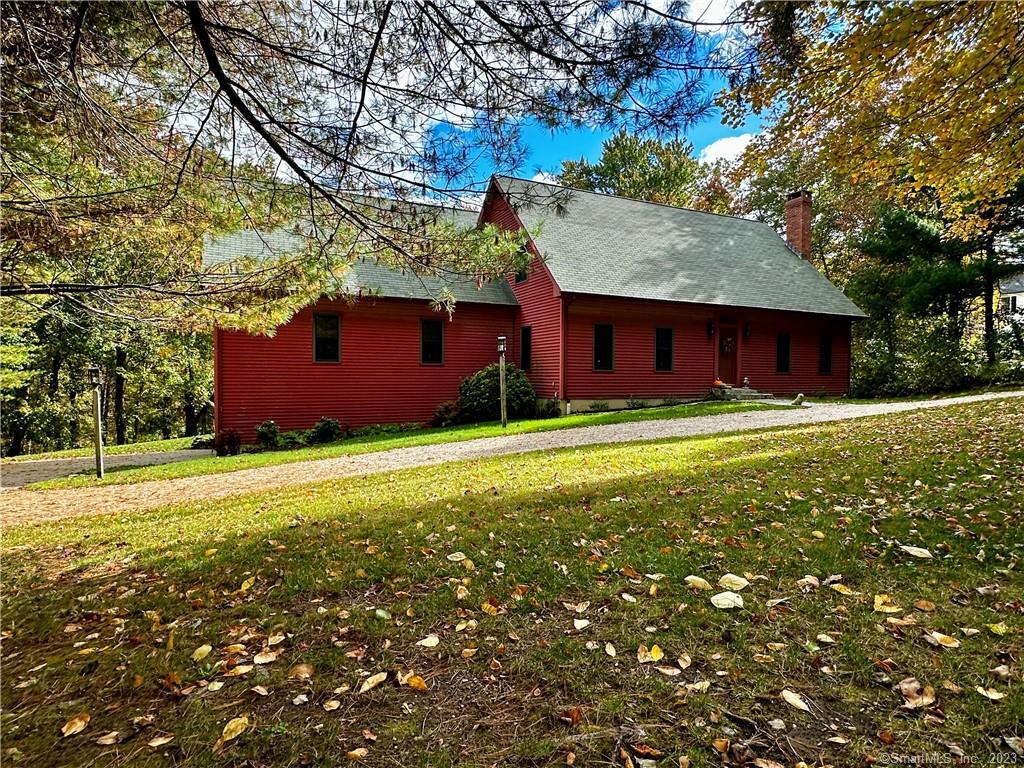 This meticulously crafted reproduction Cape is a true gem in the heart of Litchfield County. Nestled on just over 2 acres of land, this property offers a serene and timeless escape. The home boasts wide board floors and plaster walls, providing an authentic vintage feel, combined with modern comforts. With all your daily essentials on the main floor, this home offers convenient and comfortable one-level living with over 3400 square feet.The open-concept living/dining areas are perfect for entertaining, with a cozy paneled wall fireplace for those New England winters.The well-appointed kitchen features modern appliances with an expansive wall of windows. A sunroom with radiant heat provides a retreat to read a book, relax with your morning coffee or work from home. The main level includes a spacious master suite, complete with a walk in closet and en-suite bathroom. Upstairs, you'll find 2 additional bedrooms each with character and a large sitting area in the main hall. An additional 500+- sq ft unfinished room would make a great home office. Step outside to the lush, low maintenance grounds. The backyard offers endless possibilities for gardening, outdoor activities, or simply enjoying the natural beauty. This home provides a serene retreat while being conveniently located near shops, award winning restaurants, antique shops as well as being close to train stations and 90 minutes to NYC. Don't miss out on what Readers Digest named Woodbury as the Most charming small towns