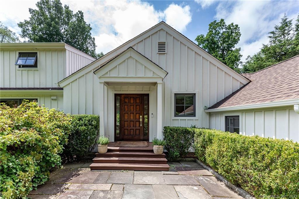 Exquisitely renovated contemporary home in the heart of Washington is now available to rent beginning Dec. 1, 2023 through May 31, 2024. Drenched in natural light with lots of windows, this home is located on Wykeham Road, minutes from the Green, Washington Depot and the Frederick Gunn School. The Leicht kitchen is a showstopper with superior European-designed cabinetry and white marble countertop boasting seamless, modern lines. High-end appliances compliment the sleek construction, including a Wolf wall oven, Gaggenau stove and oversized Thermador stainless fridge. White oak, wide plank flooring throughout adds to the crisp, clean style of the home. The open floor plan and designer lighting (Flos, Tom Dixon, Menu and Gobi) honors the simple but elegant character of this home. The en-suite primary bedroom graces the main level, with the second level offering 2 additional bedrooms and an office. Towering evergreen trees and mature perennial gardens envelop this home and give it a warm, country feel, while still being close to town center. Beautiful outdoor space and decks complete the picture for the perfect country home.