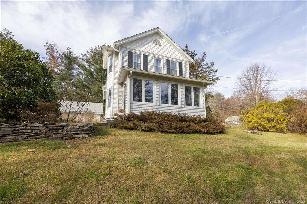 Built to Last! A Blend of Historic Charm and Modern Living! This 1900's colonial gem offers 3 bedrooms, 2 full baths, and over 1900 sq ft of living space. Hardwood floors create a warm ambiance throughout. The open-concept kitchen features granite counters and a breakfast bar, perfect for casual dining. The living room, centered around a fireplace, adds sophistication to gatherings. With a detached 2-car garage, new well, whole house generator and a full basement, this home seamlessly combines historic allure with contemporary comfort that captures the essence of Woodbury's rich history.  schedule a viewing today!