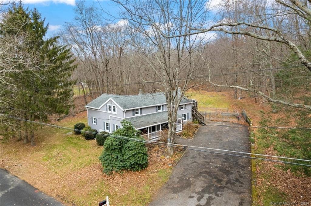 Welcome to 168 Miller Rd in Chaplin, CT - 20 minutes from UCONN and 50 minutes to Providence! This meticulously updated property offers peace of mind with MANY upgrades. The main 4-bedroom house showcases new flooring, 6 high-efficiency mini-splits for heating and cooling, and two fully remodeled bathrooms and kitchens with soft-close doors and drawers. Step outside or through the upstairs lockable doorway to discover separate bliss in the FULLY PERMITTED 800 sq ft IN-LAW STUDIO, complete with its own deck and entrance. THE LIST OF NEW FEATURES is extensive, including ALL NEW APPLIANCES, freshly painted interior, all new doors inside and out, new well water pressure tanks, all PEX water lines, and new lighting throughout. Situated on 2.5 acres, the property provides privacy from neighbors, with the option to clear space for additional activities. The septic tank has been replaced, ensuring a fully functional system. The layout is excellent, with the main house featuring 2 upstairs and 2 downstairs bedrooms. The two upstairs bedrooms can be seamlessly integrated into the in-law unit, providing versatile living options. This property is not just a home; it's a haven of transition, comfort and convenience. Don't miss the chance to experience the serenity of 168 Miller Rd—schedule a viewing today and discover the countless possibilities that await!