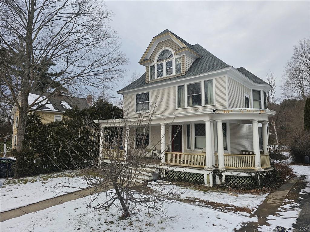 For the buyer who is looking for a traditional Turn-of-the-19th-Century Colonial style home loaded with Old World Charm and steps away from Main St South, providing for an ideal location off Main St but very close to it, allowing for a lovely short walk to Main St, this is the house for you! With some exterior TLC the exterior will sparkle like the interior does! From the moment you step onto the open front porch, you will feel the charm and fall in love with both the home and the location! The interior is accented with hardwood floors, high ceilings, beautiful woodwork throughout, original pocket doors for each of the common first floor rooms and a large walk-through pantry, with original cabinetry, connecting the kitchen to the dining room. The kitchen and both bathrooms have been completely renovated and marries the best of present day ammenities with the charm of yesteryear. The renovated kitchen shines with new cabinets, granite counters, farmers sink, tin ceiling, tile backsplash, stainless steel appliance pkg, pot filler faucet and hardwood floors. While the exterior needs some love, the mechanicals have been updated including the septic system (2005), furnace (2020), roof (2017), electric panel (2017) with 200 amp service. The plumbing has been roughed in to the walk-up attic should a future buyer choose to finish that area for additional living space. Seeing is falling in love so come see your new home!