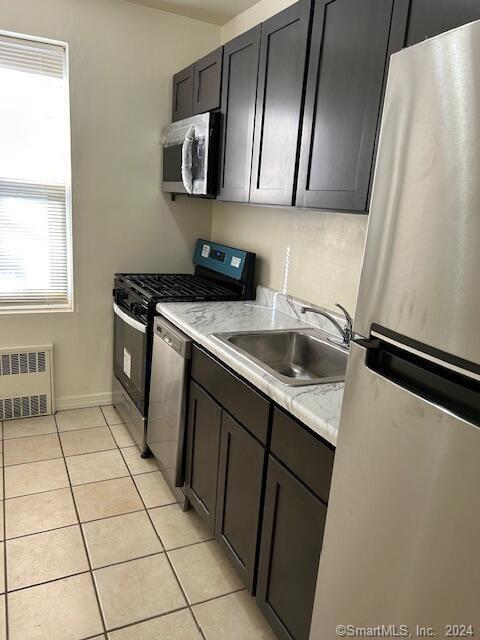 Oversized & completely renovated 1 br 1 bth apt in beautifully landscaped garden style complex in the heart of downtown Stamford! This unit features gleaming refinished hardwood floors throughout, kitchen w/ Chef's stainless steel appliances- dishwasher, microwave, refrigerator, gas stove, lots of cabinets, formal dining area, sunfilled living room, large master bedroom, fresh paint, modern retro bathroom, air conditioner, laundry on site, includes heat/hot water, cooking gas, low security deposit, pet ok, walk to train, shops, nightlife, minutes to highways and beaches, off st parking, garage space avail for additional fee, professional gym, 24 hour emergency maintenance. short/long term lease option