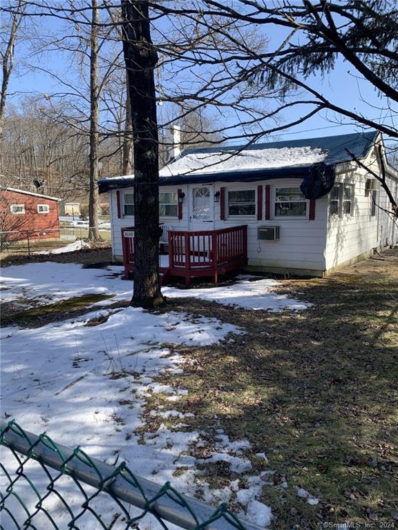 Cozy Ranch, Two Bedroom, One Full Bath on .13 acres with a privacy fence. Quiet, peaceful neighborhood very close to shopping, Danbury and New Fairfield. A great starter home or perfect for an investment property. The home is sold as is and needs work. The basement has mold, you must wear a mask. The property is subject to Probate.