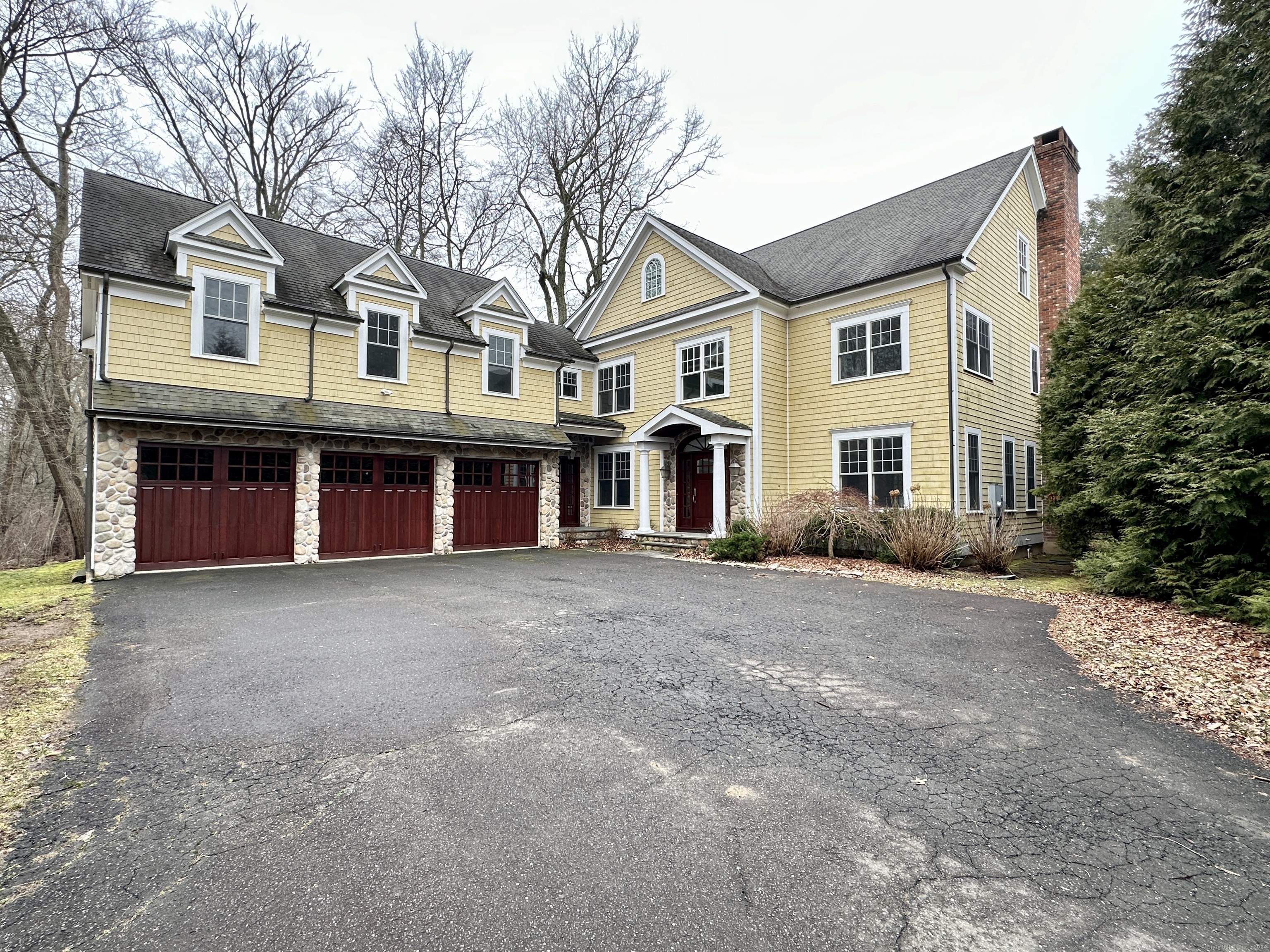 Don't miss the wonderful opportunity to own this quintessential colonial home that encapsulates the very essence of suburban living. Nestled on a highly desirable road, it seamlessly combines convenience and serenity while offering the chance to become part of a close-knit community. This 2007-built residence spans three levels, providing a generous 5,000 square feet of interior living space, ensuring ample room for your family's needs. The heart of this home is the stunning eat-in kitchen, featuring a large island, high-end appliances, and abundant storage, flowing effortlessly into the family room, perfect for relaxation and entertainment. Whether you prefer to snuggle up in front of the wood-burning fireplace in the living room or indulge in formal dining, this home caters to your desires. Step outside to enjoy private indoor-outdoor living on the tucked away patio just off the kitchen, ideal for dining and relaxation. The primary suite offers a personal sanctuary with a walk-in closet and ensuite bath, and three more spacious bedrooms provide individual retreats for everyone. The lower level offers added flexibility with an unfinished basement and a full bathroom, allowing you to customize the space to your liking. With NYC less than 50 miles away and a nearby train station, commuting is a breeze. Don't miss out on this exceptional suburban gem.