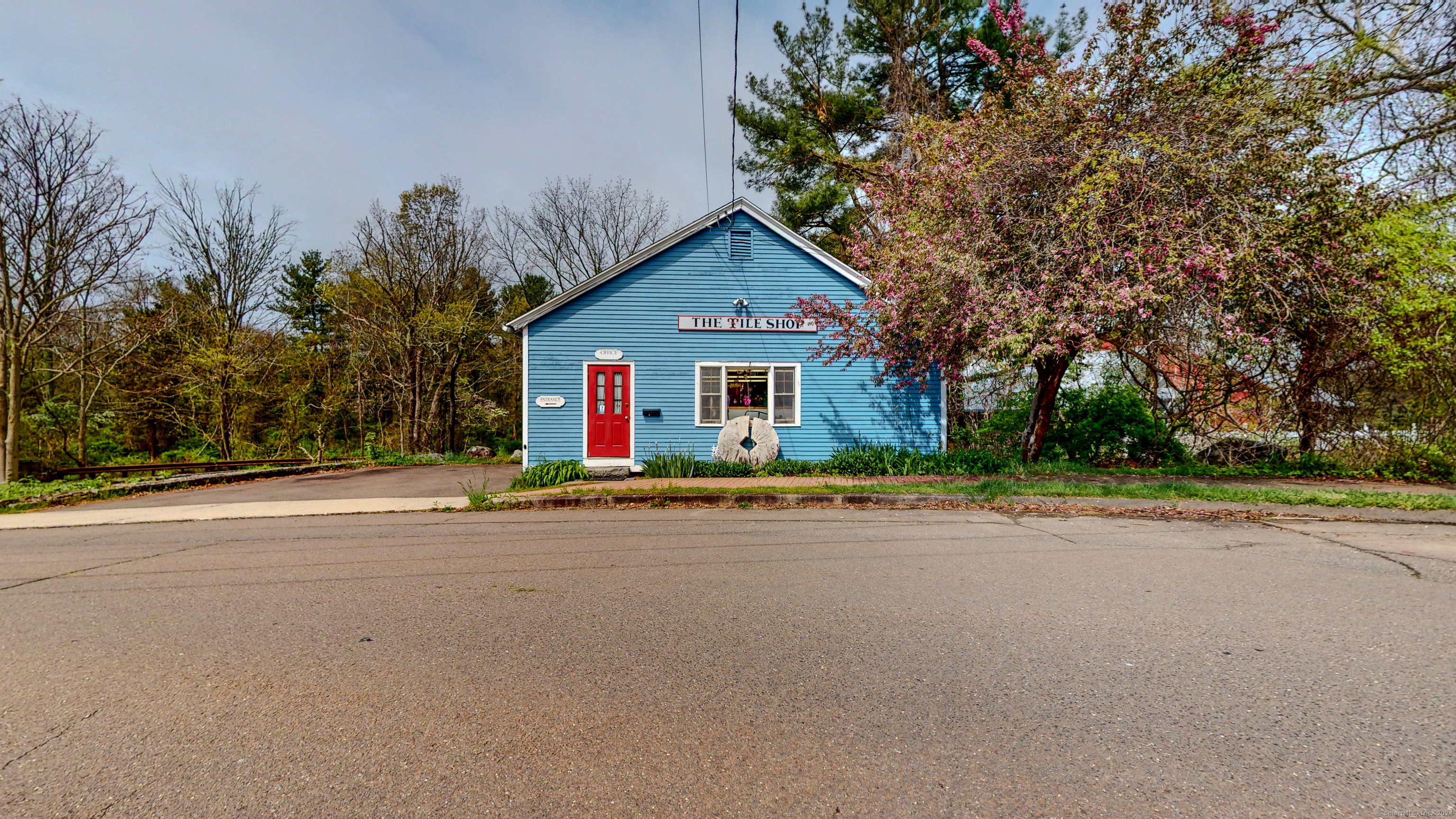 Welcome to this unique opportunity in the heart of Guilford, where history meets business potential. Nestled alongside the picturesque Millpond, this antique building offers an experience that blends charm with functionality. At the forefront of this offering is a tile shop, boasting a spacious 1200 square foot showroom. With its prime location and captivating views, this showroom serves as a canvas for showcasing exquisite tile designs, while also providing a comfortable office space and a convenient bathroom for customers and staff. Descend the stairs to discover a hidden gem-the basement area, ripe with potential for expansion or additional showroom space. Here, the ambiance is truly unique, as the gentle flow of the West River beneath the building adds a soothing backdrop to your business operations. The possibilities for this property are as varied as they are exciting. Whether you envision maintaining the current tile shop and showroom, transforming the space into an art gallery to showcase local talent, or establishing a professional office such as an attorney's practice, the flexibility of this building allows you to turn your vision into reality. With this sale, you're not just acquiring a building-you're gaining an additional business that complements the tile shop seamlessly. A tile contractor business rounds out this package, offering a diverse revenue stream and opportunities for growth.