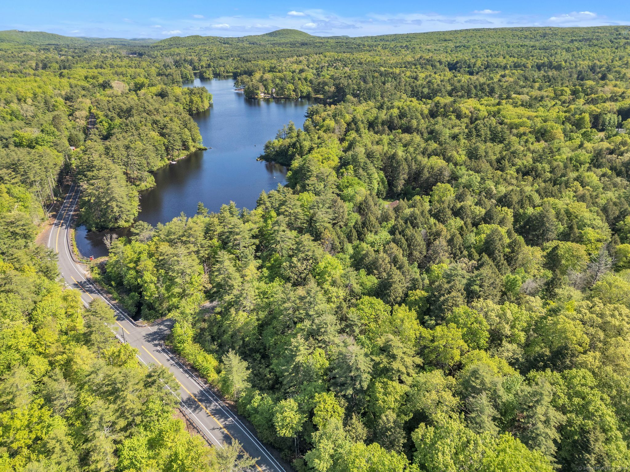 Build your dream home on this picturesque buildable lot located on Stony Lane in Stafford, CT. Nestled near the tranquil State Line Pond, this lot offers the perfect blend of privacy and natural beauty. Imagine waking up to serene water views and enjoying peaceful walks along the pond. The generous lot size provides ample space for various home designs, while the location offers convenient access to nearby amenities and outdoor activities. Whether you envision a cozy cottage or a spacious home, this lot is the ideal canvas for your vision.