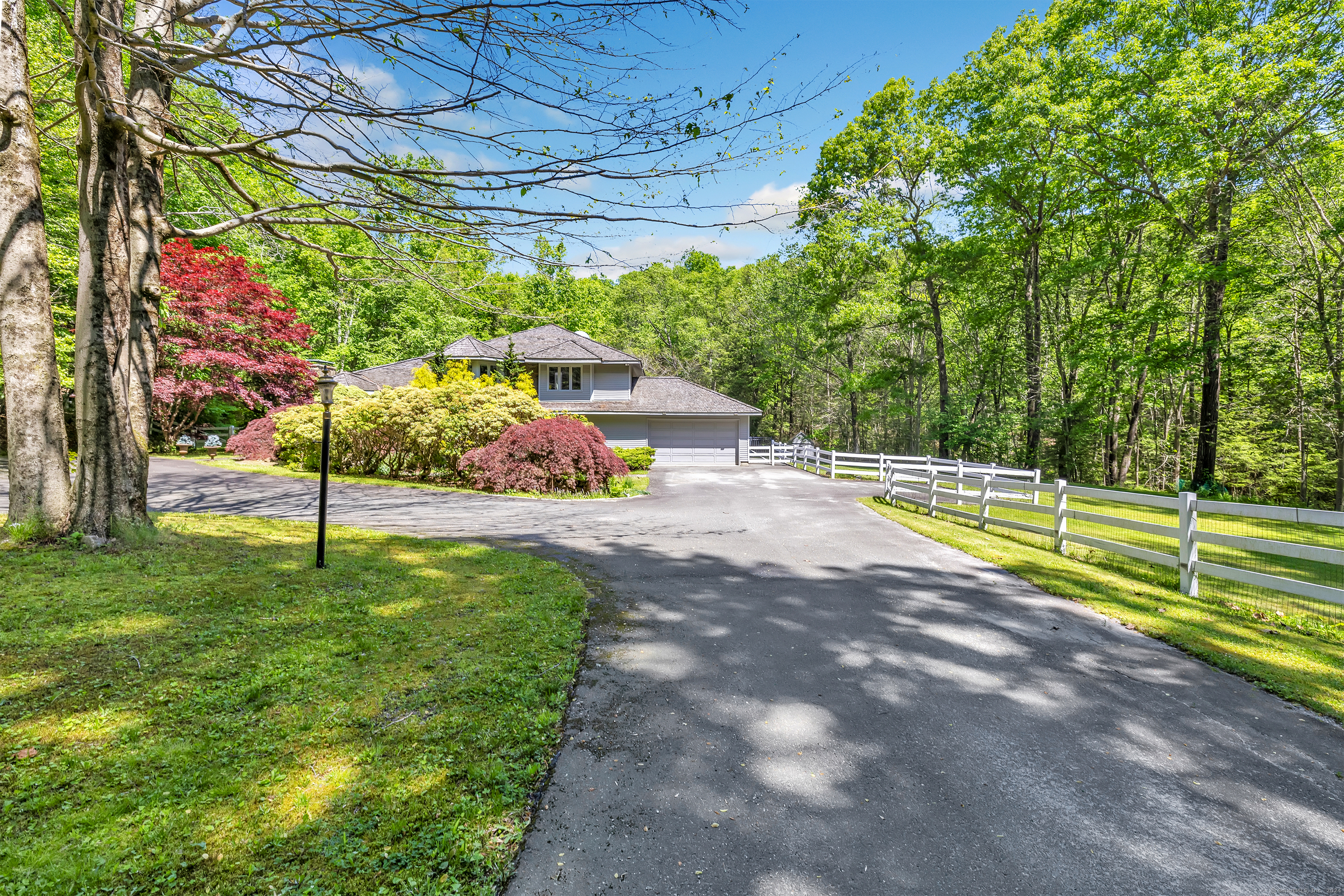 Located in The Beautiful Hills of Litchfield County on the Woodbury / Roxbury Line! Lots of Privacy Awaits You in this Beautiful Colonial/Contemporary on 9.97 Acres of Serenity w/ Mature Trees, Plantings, Lush Greenery & the Peaceful Sounds of Transylvania Brook that Flows Behind the Home. Enjoy The Outdoors in the Heated Gunite Swimming Pool w/ Beautiful Stonework, Fenced in Yard & 3 Good Size Sheds. Very Unique Home w/ Double Door Entry that Leads you into a Spacious Foyer w/ an Indoor Water Feature, 3 Generous Size Bedrooms, Remodeled 2.5 Baths, w/ Italian Marble Tile, Recessed Lighting throughout Home, Lower Level Family Room w/ French Doors leading out to Patio & Swimming Pool, Office Space, 4 Season Sunroom w/ French Door & Plenty of Windows, 2 Car Garage, Lots of Storage, Huge Unfinished Basement, C/AIR & Whole House Generator. Primary Bedroom Suite Features a Separate Room that can be used as You Choose w/ Lots of Windows, Jacuzzi Tub, Walkin Closet & Balcony Overlooking Swimming Pool. Long Paved & Lighted Private Driveway Leads You to an Oasis. A Nature Lovers Dream! This Home is a Must See!