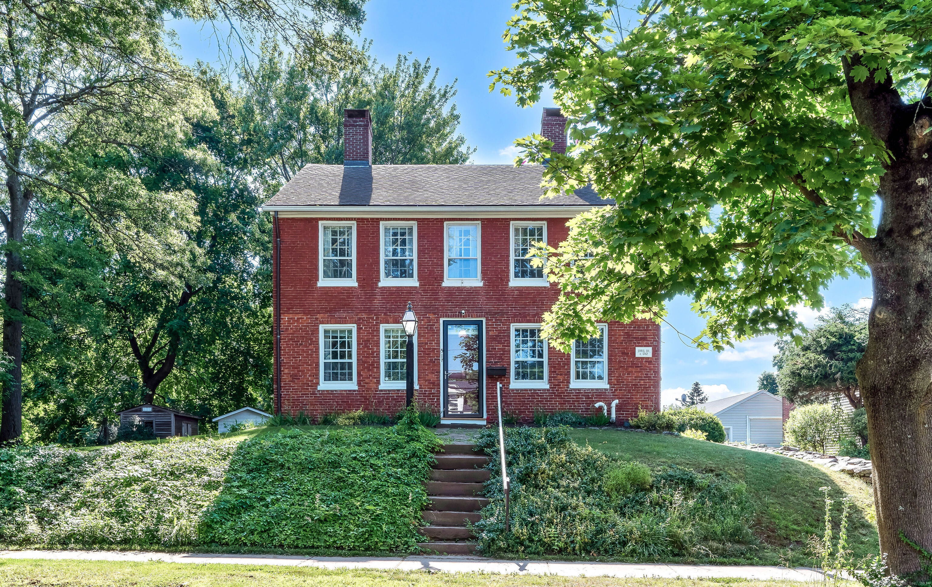 Incredible opportunity to own a classic brick colonial that has been completely renovated. The beautiful fireplace's help add to tremendous character this home has. This property has all the classic features and charm you would expect in an antique style home while giving you the feel of newer construction at the same time. Not only is the kitchen completely remodeled, newer roof, fiber optic internet run through house, the entire platform/support in basement of the home was completely rebuilt a few years back, the home has been totally repainted, original wide board floors gleam, brand new furnace and AIR CONDITIONING SYSTEM. Yes, I said AIR CONDITIONING. The back door walks out to a newly installed patio. This property is a very rare find in that it is an antique home that you can simply move into. Well worth the visit