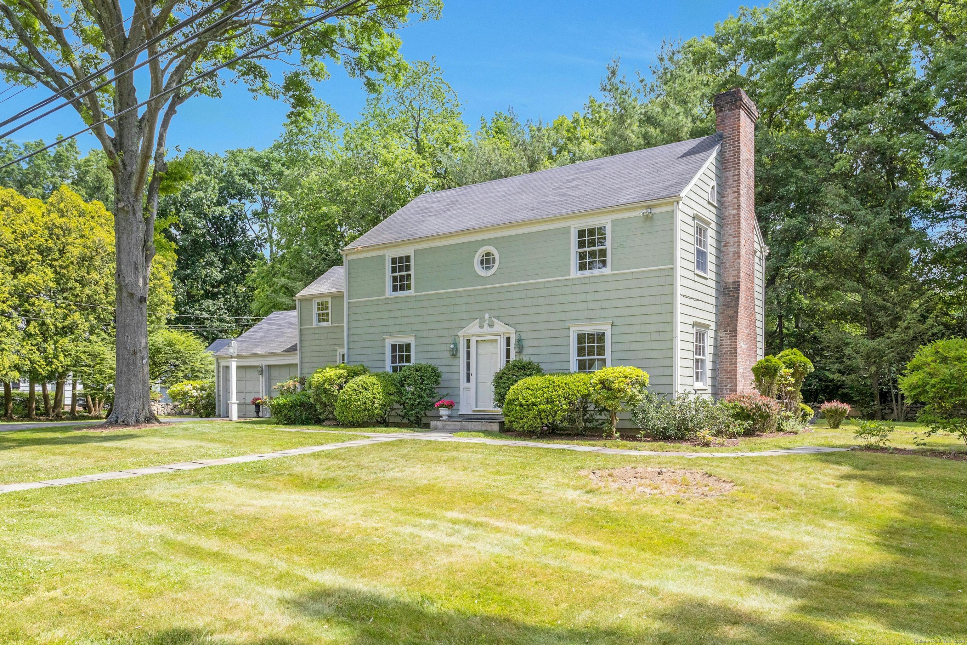 Wonderful 1940's colonial in one of the most sough-after neighborhoods on a cul-de-sac. An oversized level lot, with an idyllic English garden, and plenty of room for all. Formal living room with FP, formal dining room, magnificent oversized kitchen with vaulted ceilings. Kitchen has new counters, cooktop, refrigerator, as well as plenty of space to sit at the island or a separate informal dining table. Patio right outside slider to entertain or just BBQ. Spacious family room with FP, vaulted ceiling and character windows. First floor also has an office or 4th bedroom, full bath, and a generous sized laundry room. The second floor boasts a large master bedroom, plenty of closet space, and en-suite bathroom. Two additional bedrooms share a lovely hall bath. Additionally, there is an extra room - great for sitting room, or even an additional bedroom with closet. Storage in walk up attic or large unfinished basement. Full house generator and Central Air. Interior rooms freshly painted. Hardwood floors throughout, many just redone, kitchen has tile floor. Beach rights. Agent related to Owner.