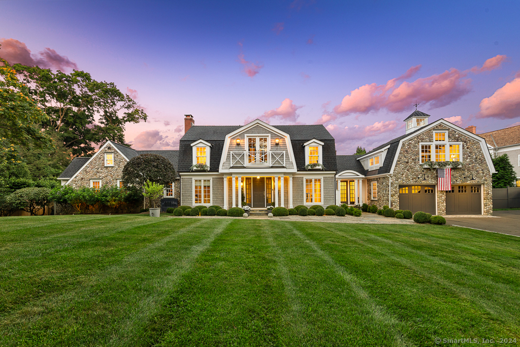 A rare opportunity to experience luxurious living in one of Connecticut's most coveted neighborhoods: Southport Harbor. This extraordinary, custom, 5 bed, 5.5 bath Nantucket shingle & stone home features exceptional living spaces & timeless sophistication throughout. The elegant decor melds impeccable craftsmanship, modern design & high-quality construction features. Every detail has been meticulously planned & curated, from the newer white oak flooring, to the exquisite designer lighting that adds elegance & ambiance to each room, to the marble and tile selections, to the custom built-ins and millwork, to the hi-tech features. From the moment you step inside, you are captivated by the home's beauty. The gourmet kitchen features custom cabinetry, high-end appliances, an oversized Calcutta marble island, vaulted and paneled ceiling, and a breakfast area. The kitchen opens to the family room with another stunning vaulted ceiling, fireplace with marble surround and French doors to the back patio. The dining room boasts a sultry wet bar, and French doors to the courtyard & impressive backyard oasis.The outdoor entertaining spaces feature a saltwater gunite pool with waterfall, auto safety cover, year-round spa, large stone fireplace, several patios, pizza oven, built-in BBQ, pergola, life-sized chess/checkers, raised gardens & separate grass play areas. The home is geothermal & solar powered, for substantial utility cost savings. Walk to Southport Beach, Harbor, Equinox and Train