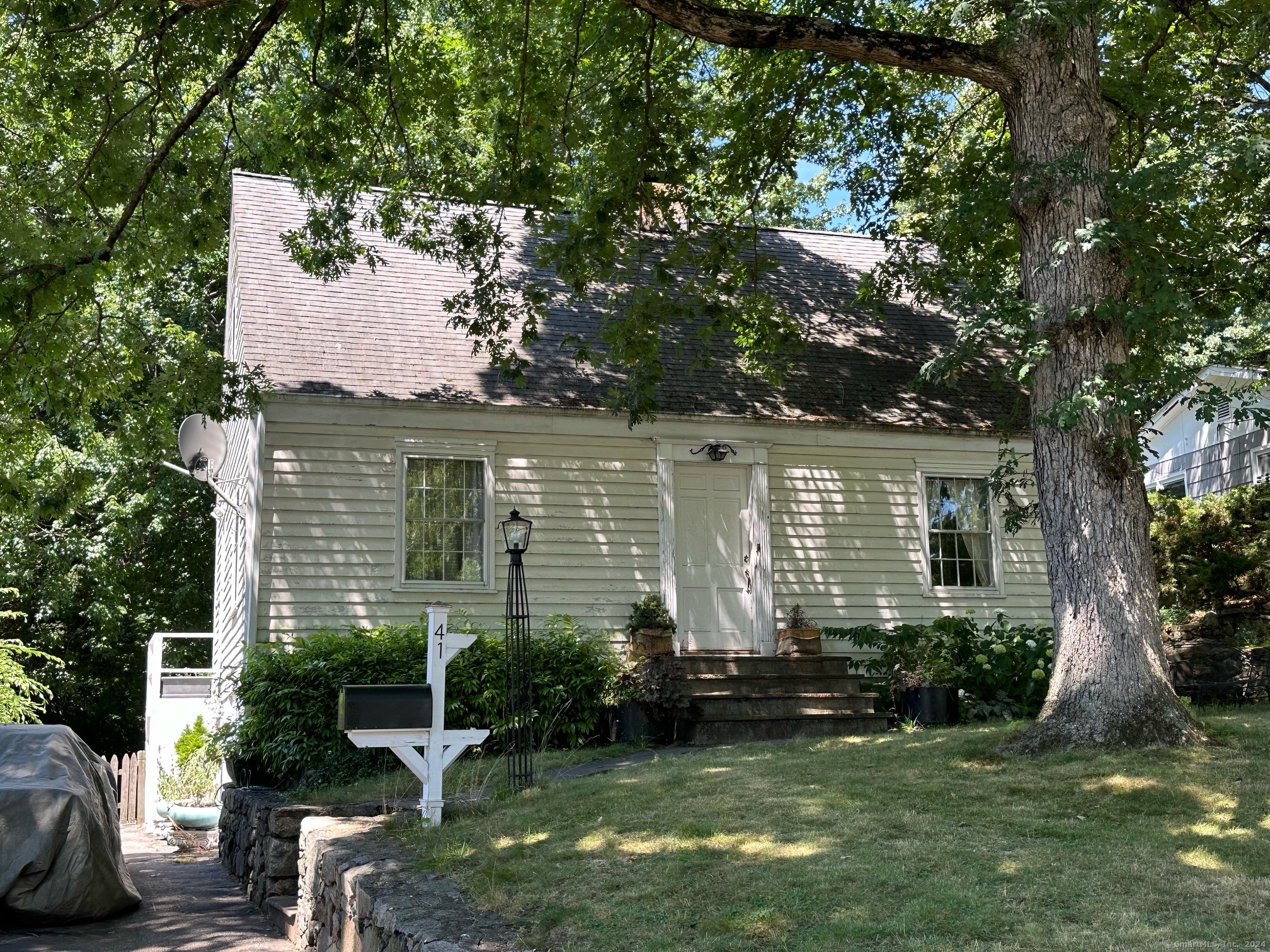 Nice cape in Brookside on quiet street. Hardwood flooring, large living room with wood burning fireplace. Lovely oversized lot with mature plantings!!! Potential for 3rd bedroom on main living level. Subject to probate court approval. Sold "as-is".