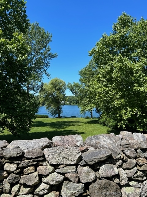 Newly updated!! Spacious waterfront home, stunning lake views, desirable location - what more could one want in a rental? This custom-built colonial located in the desirable Crystal Lake community boasts both privacy and convenience. From the moment you pull up, you are captivated by the impeccably manicured lawn, mature trees, and lake view. The bright and airy home gives a feeling of warmth and relaxation upon entering the grand foyer. High ceilings, an oversized stone fireplace, and continued sweeping water views are just a piece of what makes this home special. The first-floor layout makes entertaining friends and family all year long a breeze with a large eat-in-kitchen, dining room, and spacious living, and study/family room. Guests will enjoy peace and privacy in the lower level very large guest suite. After a long day head up to the expansive master suite equipped with a full bath with soaking tub, and a large dressing room/walk-in-closet. An additional very spacious bedroom with a full bath completes this level. Two car garage. Unfinished lower level perfect for storage or gym space. Beautiful outdoor space ready for spring/summer BBQs and lots of late-night laughs. Enjoy the benefits of lake life just in time for summer - kayak, canoe, stand up paddleboard - the choice is yours! On the Weston/Westport border. A short ride to shops, dining and entertainment. Move right in!