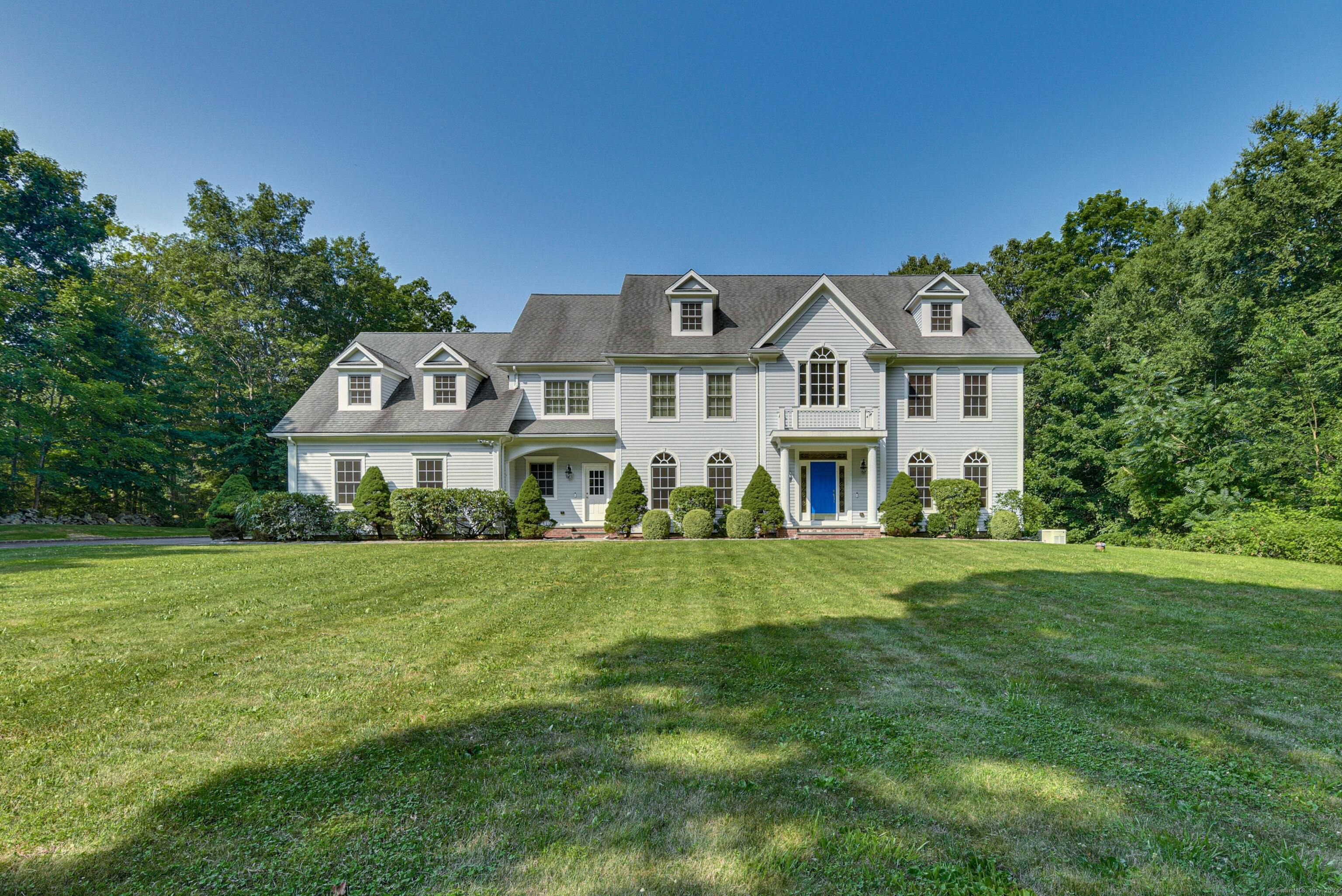 Welcome to 19 Old Sow Road, a 2007 stately Center Hall Colonial that exudes classic elegance, sophistication and modern comfort. Spanning 4516 sq ft with an additional 2,075 sq ft unfinished walk-out basement, this 5-bedroom, 4 full and 2 half-bath home is a testament to sophisticated country living. Upon entry, your are greeted with a bright and airy interior. The grand 2-story foyer with marble flooring leads to a cherry and granite kitchen, equipped with Wolf, Sub-Zero, and Miele appliances, opening to a family room with cozy gas fireplace. Formal living and dining rooms, along with a convenient mud room, enhance the home's functionality and thoughtful design. Upstairs, the primary suite offers a marble bath with dual sinks, a separate shower and a jetted tub. Two ensuite bedrooms and two sharing a Jack-and-Jill bath complete the upper level. High ceilings, hardwood floors, striking mill work, and a walk-up attic for storage add to the home's timeless appeal. Nestled on 3 verdant acres on a quiet country road, the property includes a 3-car garage and a 22KW auto generator. First owners, excellent condition, and ready for your personal vision! Mere minutes to Easton Center and Fairfield area sites, shopping, farms, restaurants, commute routes. Discover bucolic Easton, CT, an oasis of rural charm... Discover 19 Old Sow Road... timeless appeal, sophisticated country lifestyle and a home where memories are made.