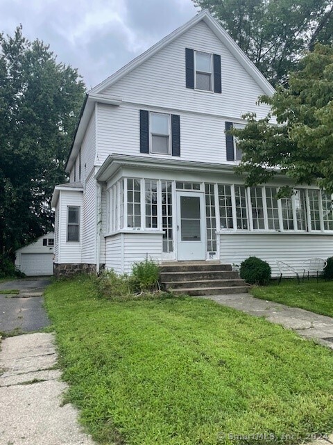 There's space for everyone in this farmhouse colonial located on a quiet street less than a mile walking distance to West Hartford Center, Blue Back Square, and Park Road shops and restaurants! Boasting large rooms, high ceilings and hardwood flooring throughout. Enjoy an enclosed front porch leading to a large living room and dining room with hardwood floors. The updated kitchen has a large breakfast bar island, ample storage, gas cooking and hardwood flooring plus a convenient laundry room. The second floor boasts 3 bedrooms with hardwood floors and a full bathroom. 2 bedrooms with hardwood floors and a full bathroom are located on the 3rd floor and make great home offices. There's a full basement for storage plus a detached 2-car garage, storage shed and ample parking. The large, fenced level lot offers great space gardening or recreation. Easy access to I-84 for commuting. Currently tenant occupied and can be sold to an investor with tenants in place or vacant for an owner occupant.