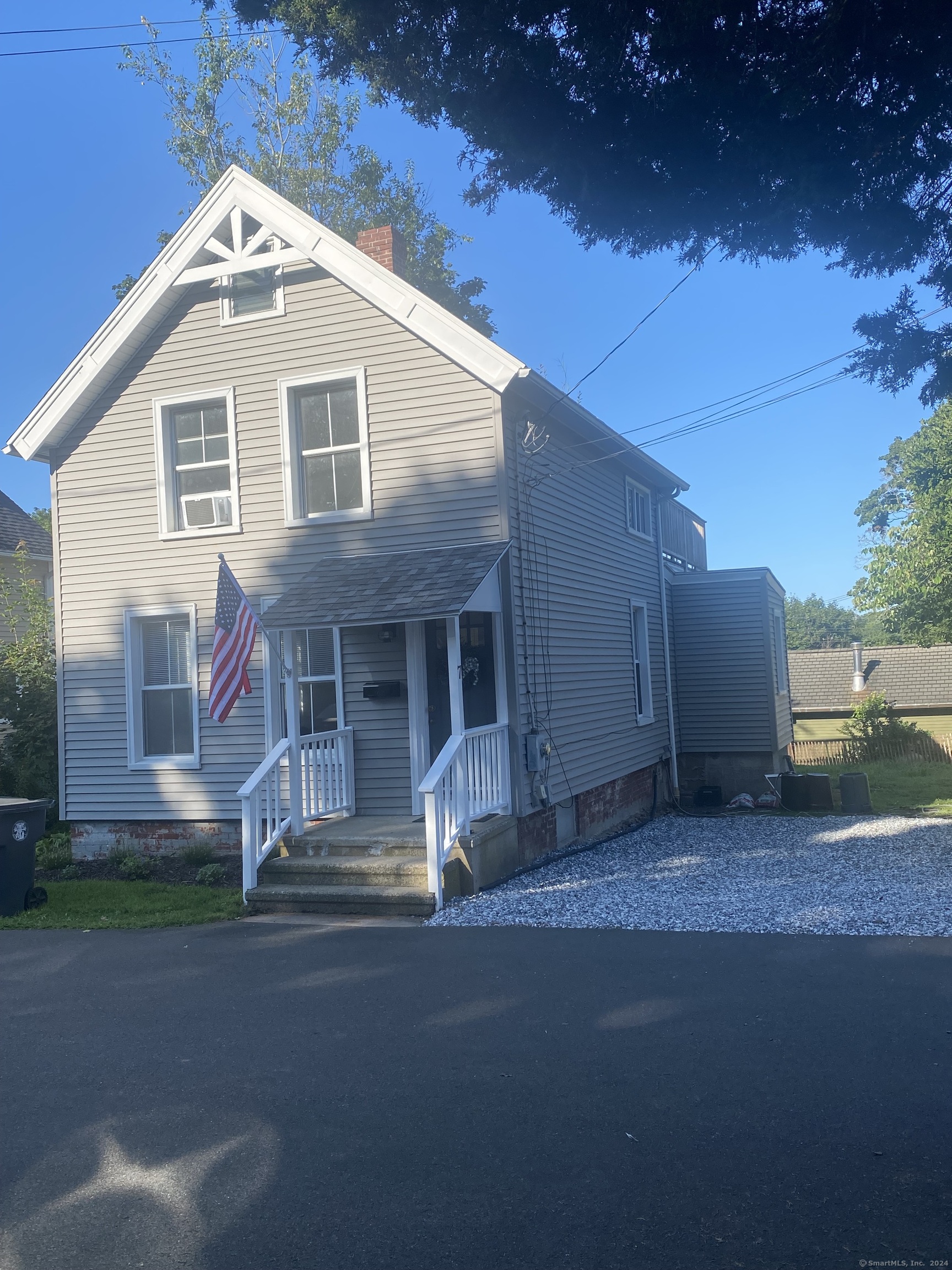 Nestled in the charming and historic community of Stony Creek, Branford, this beautifully remodeled quarry house is a rare opportunity to own a piece of local history. Situated on a spacious 0.7-acre lot atop Bowhay Hill Road, the home boasts approximately 1, 065 square feet of living space, featuring 2 bedrooms and 1.5 bathrooms. The location is truly remarkable, offering picturesque winter views of the Thimble Islands and close proximity to the Stony Creek harbor. This 1890 wooden-frame house, one of the original buildings in the area, has been thoughtfully updated with a modern kitchen equipped with stainless steel appliances, and an open-concept living and dining area complete with hardwood floors. The light-filled interior seamlessly blends with the natural surroundings, providing an ideal setting for those who appreciate stunning sunsets and expansive views. Stony Creek is a vibrant seaside village, rich in history and cultural attractions. The property is within walking distance to the town beach, marina, parks, and the Legacy Theater. The Washburn-Weil trailhead is nearby, offering a beautiful system of hiking trails that connect to Pine Orchard and Guilford. Residents will enjoy the close-knit community, with morning walks by the harbor, views of the Thimble Islands, and meet-ups at locally-owned shops. The area is also home to the Willoughby Wallace Library, Stony Creek Museum, Stony Creek Boating Association, and several quaint dining and shopping options.