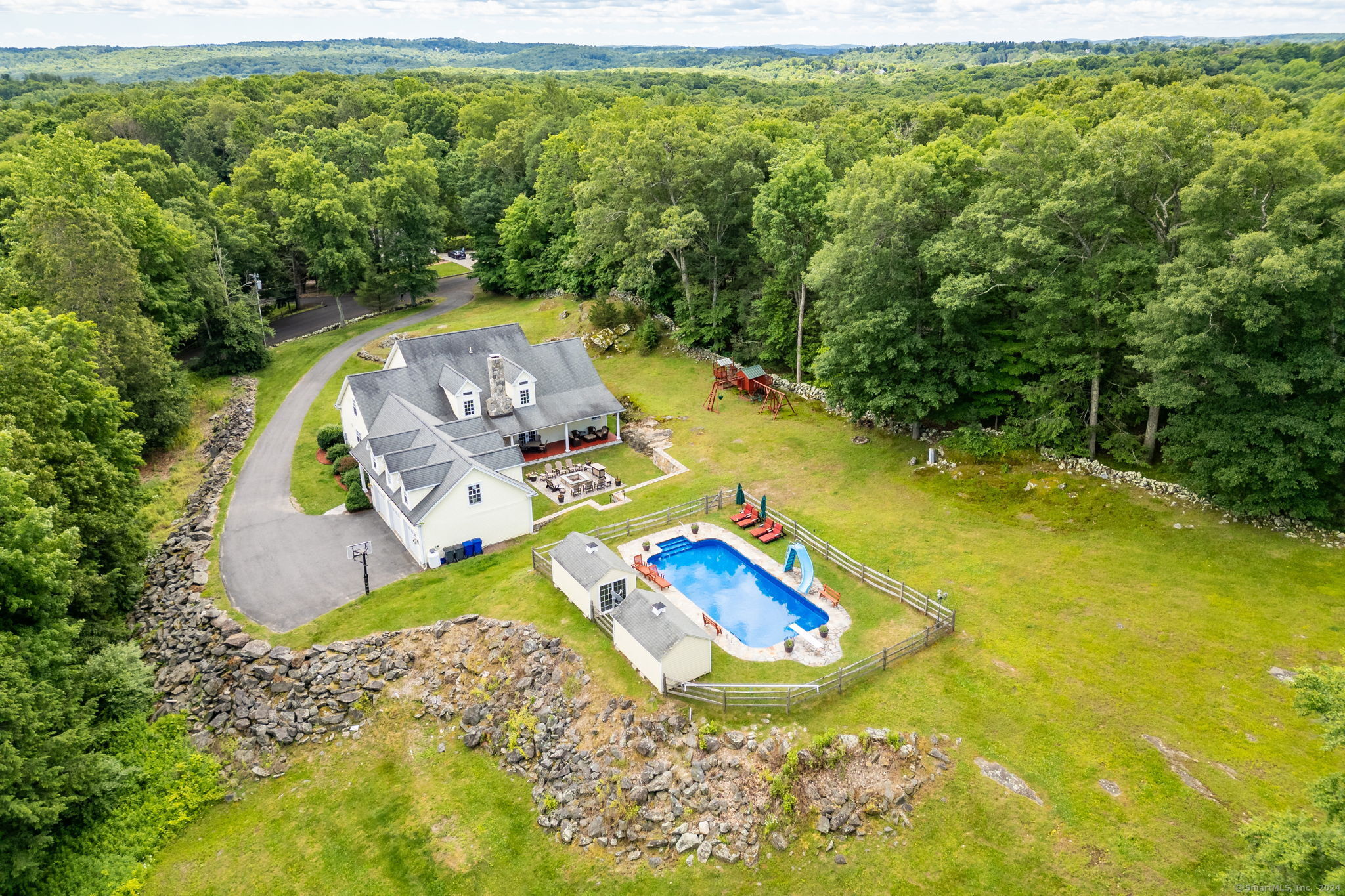 Pool with 2 Pool Houses