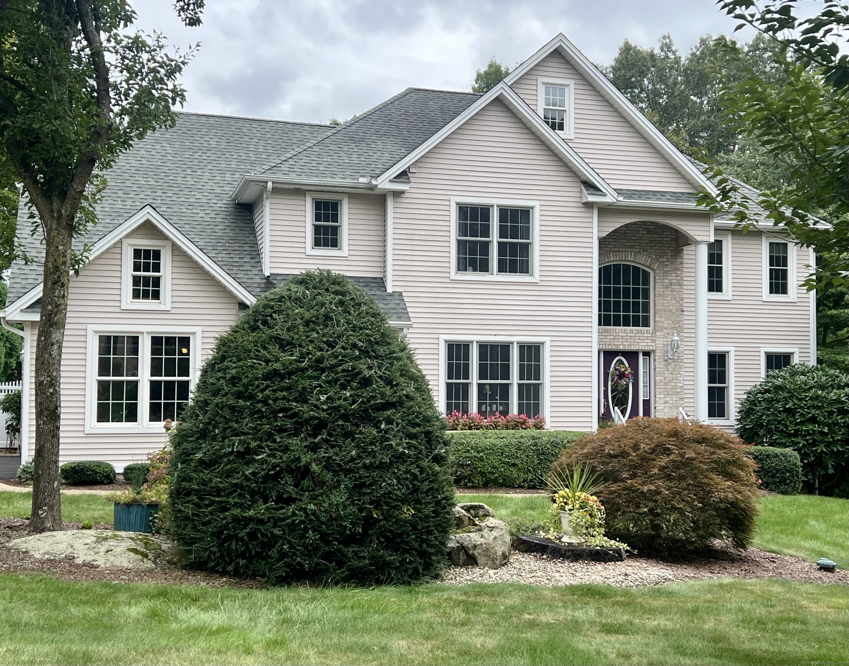 Welcome home! With a host of recent upgrades including a newer roof, HVAC system, hot water heater, septic tank, and well pump, discover this beautifully maintained 4-bedroom, 3.5 bath stately Colonial. This picturesque home features a desirable layout, gleaming hardwood floors, and updated bathrooms set on an acre in a lovely neighborhood. Experience a spacious, move-in-ready interior and a private backyard perfect for relaxation and outdoor activities. Outdoors you can enjoy a heated in-ground pool, stamped concrete patio and composite surface deck shaded by the retractable awning with seasonal views and glimpses of sunsets over Southington Mountain. After 27 years, it is time to hand the keys over to new owners to enjoy for years to come.