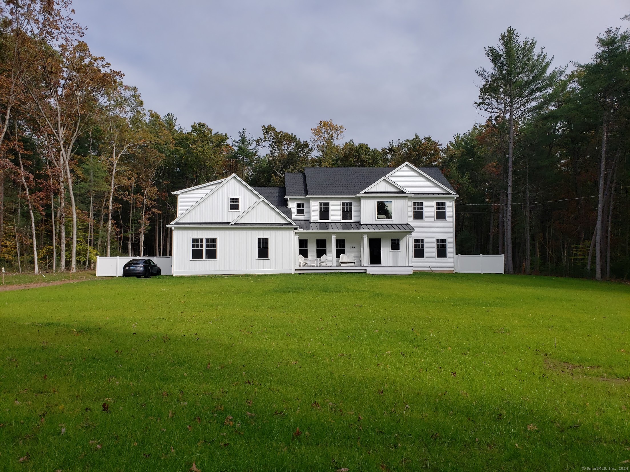 To be built. A stunning country colonial home, located on a fully cleared .39 acre lot in Kensington, in a quiet area with pastoral farm views. Spacious 2, 550 sq. ft, four large bedrooms, 2.5 bathrooms, walk out basement with 9' ceiling, windows with option to finish, stately front porch with standing seam metal roof, rear deck. Open floor plan, first floor 9' ceilings. Kitchen featuring; custom cabinets, quartz counter tops, full Samsung SS appliance package, chimney hood, in island microwave. Formal dining room with extensive trim/molding. Front to back family room with gas fireplace and granite surround. Hardwood flooring throughout the first and second floors. Second floor features four large bedrooms, with large master suite featuring; WIC, linen closet and second clothes closet. Second floor laundry room. Quality trim throughout; crown molding, wainscot paneling, chair rail, etc. Energy efficient. Option to finish additional sq. ft in walk out basement. Located across the street from a former farm, on a quiet country street, and a quiet area. Close to Timberlin Golf Course, Ragged Mtn Preserve, Chamberlain Hwy, Rt. 9, 72, 691 and 5, shopping, restaurants, train station, and more! Note, these floor plans and photos are from builders other completed homes; additional plans & finishes available for your custom home. For GPS use 940 High Road which is a house across the street.