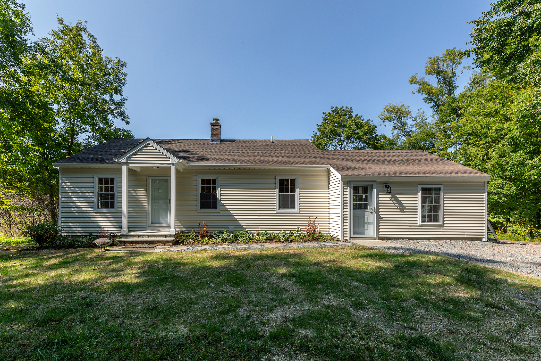 Just 5 minutes from the famed Litchfield Green and all its restaurants, entertainment, and culture you will find this hidden gem on a bucolic country road surrounded by hundreds of protected acres of land. This complete luxury renovation was just completed on this charming home just 2 hours from Manhattan. With gleaming hardwood floors and plenty of open space, one can enjoy this peaceful, private, and tranquil home in the Litchfield Hills. Two generously sized bedrooms upstairs and a large flexible family room on main level insure this home has space for all to find respite. A large bedroom graces the downstairs with a walk in closet and oversize full bath. Meander out the patio door to the beautiful stone terrace with pergola overlooking the garden while taking in views of the protected meadows and open space. Live life to the fullest at this beautiful home.