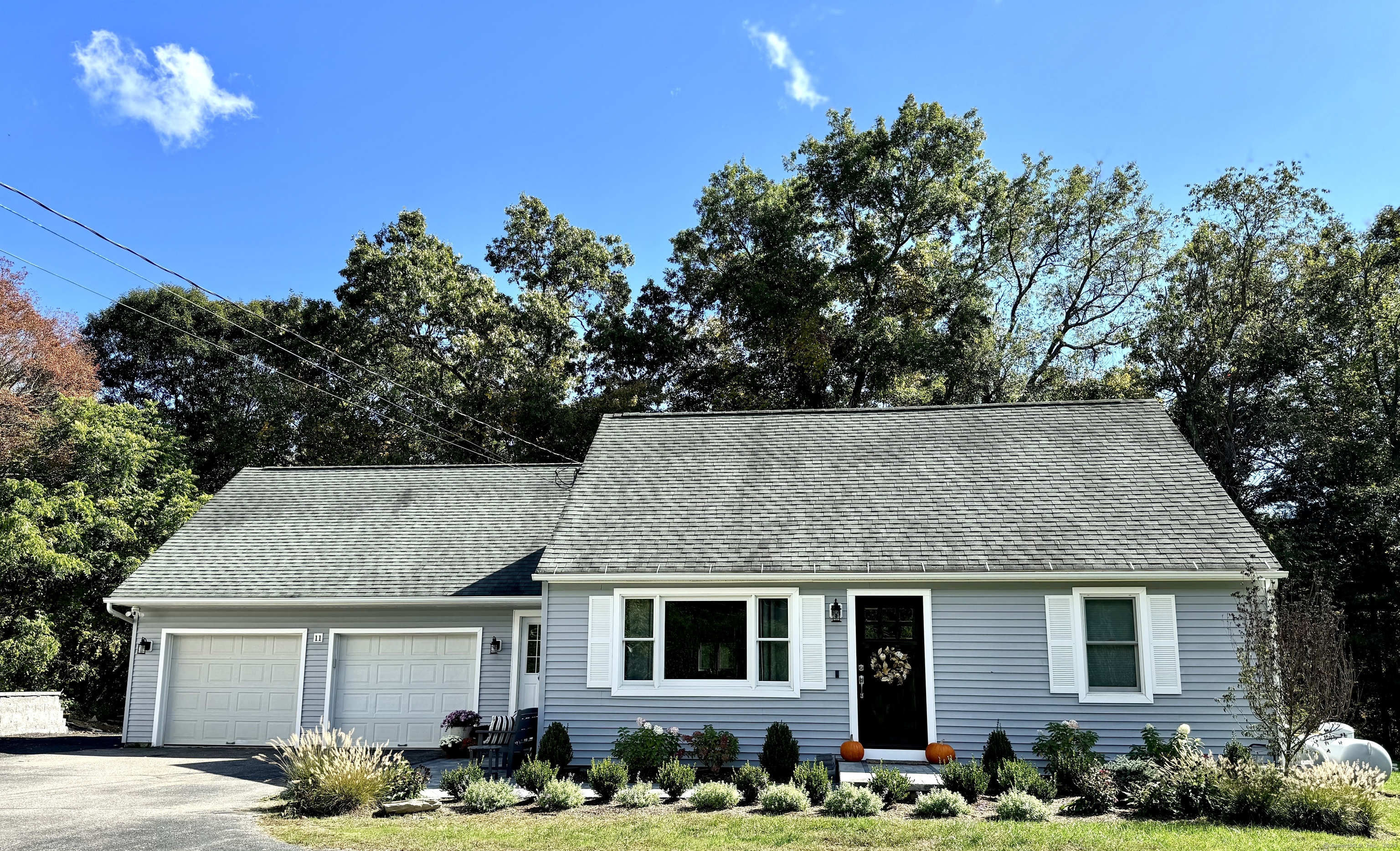 BETTER THAN NEW! 1.5 miles to Lake Waramaug Town Beach! Move in and do literally nothing but unpack your personal belongings. Turnkey home that was lovingly and meticulously renovated for the current homeowner. Prepare to entertain in your gorgeous kitchen that opens up, just enough, into a welcoming living room. Or head out on the back deck. This 3/4 bedroom home features one bedroom plus an office on the main level, with a beautiful fully renovated full bath. Upstairs are 2 more bedrooms with another equally stunning full bath. Hardwood floors refinished, new plush carpet upstairs. Not an inch was left untouched with accents of shiplap in the bathrooms and bedrooms. The exterior has been professionally landscaped with beautiful perennials that surround the property, a new front walkway that simply says welcome home. A gorgeous lighted retaining wall was installed that makes for additional parking and increased curb appeal. Plenty to keep you entertained with amazing restaurants, shopping, hiking..this is the home for you.