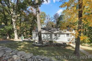 Welcome to this beautifully renovated ranch home in historic Ridgefield, CT! This charming property features 3 spacious bedrooms and 1.5 modern bathrooms, making it the perfect retreat for families and individuals alike. Step inside to discover a stunning, redone kitchen that will delight any home chef. It boasts Fabuwood shaker-style cabinets, complemented by elegant quartz countertops, creating a perfect blend of style and functionality. The open layout seamlessly connects the kitchen to the dining and living areas, ideal for entertaining or cozy family gatherings. The living room is enhanced by a cozy pellet stove, perfect for those chilly evenings. Located in a convenient area within walking distance to local amenities, this home has both comfort and accessibility. Enjoy the serene surroundings of Ridgefield, with ample outdoor space for relaxation and play. This property combines modern updates with classic charm, providing a warm and inviting atmosphere. Don't miss the chance to make this lovely ranch your own!