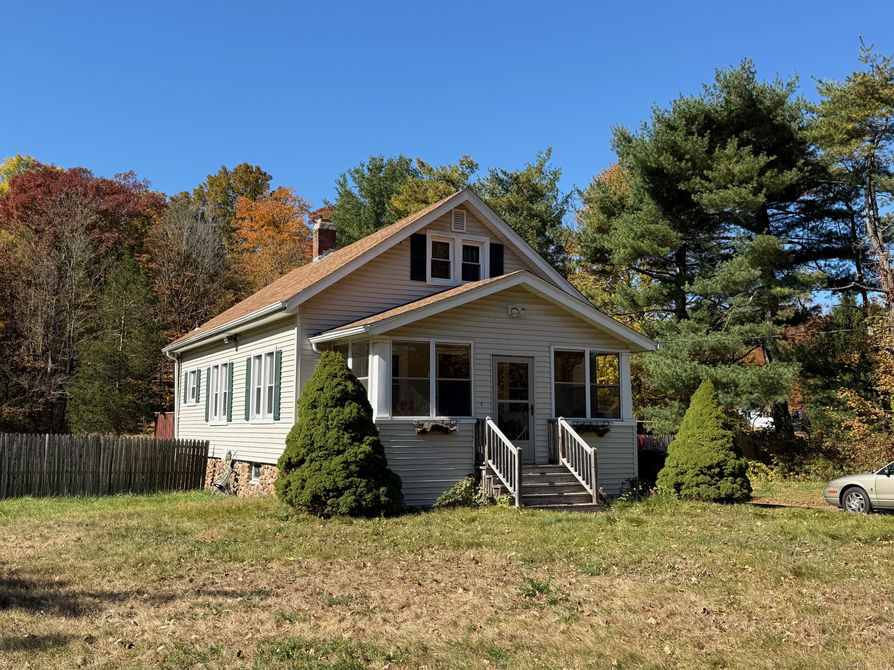 Lovely well built Cape Cod on over 2 acres of land in Berlin!! Sweet home with both bedrooms on the main living level and full walk-up attic waiting to be finished! Attic space has full bath plumbed in. Property has newer septic in 2002 per previous listing. Lovely 3 season front porch and great deck in the back. House has two driveways for tons of off street parking. Beautiful property backing up to open space!! To be sold "as-is".