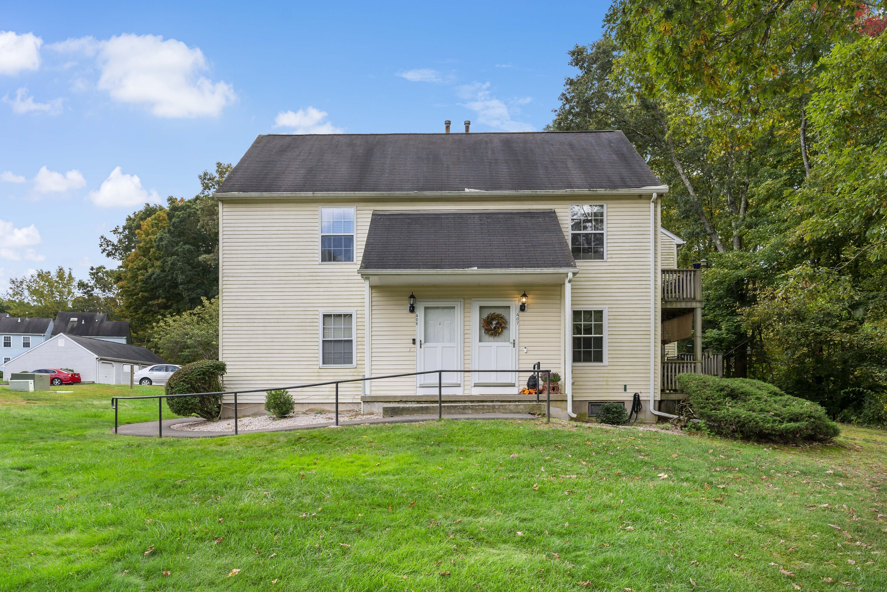 Discover this pristine 2-bedroom condo in the desirable North Farms community, set in a peaceful and serene location. Enter through your private entry, leading up a short flight of stairs to this sun-filled ranch end unit that exudes warmth and welcome. Relax on your Trex no-maintenance deck, enjoying views of manicured grounds and a tranquil creek. This home features an oak cabinetry kitchen with tile flooring, and stainless steel appliances. The open floor plan combines the dining and living areas, adorned with hardwood floors and slider to the deck, perfect for entertaining. Both bedrooms offer hardwood floors and spacious closets. A washer/dryer hookup in the hallway closet provides added convenience. Enjoy economical natural gas heating, central air conditioning, and ample attic storage. Designated parking is just steps from your door. North Farms is ideally located just minutes from Routes 1 and 80, shopping, dining, and shore points. For outdoor enthusiasts, hiking trails and North Farms Park are nearby. This well-run association offers a perfect blend of location, affordability, and easy living. Don't miss your chance to call this beautiful condo home!