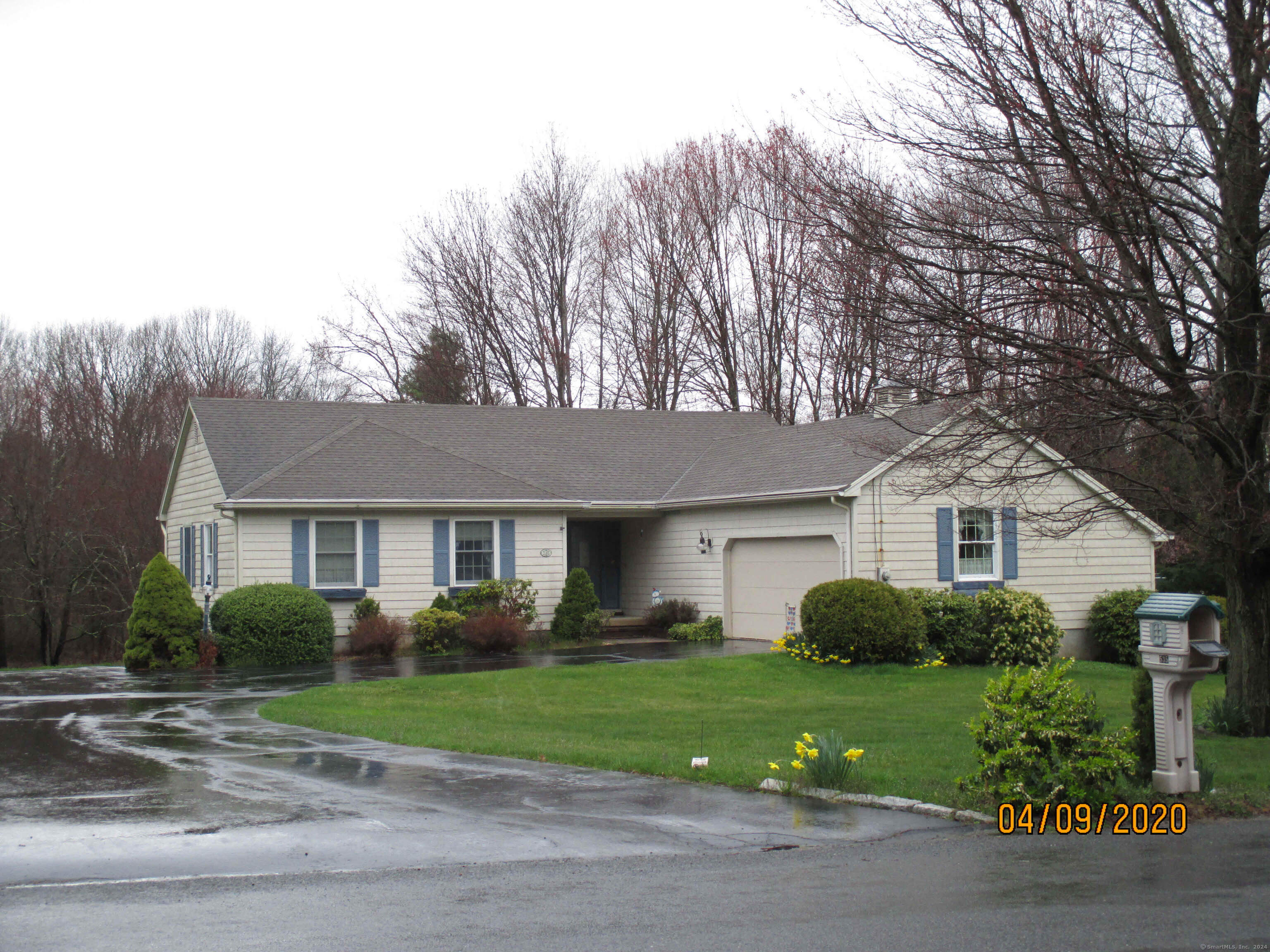 Your Dream Home Awaits You!! Lovely L-shaped ranch built in 1993, offering a seamless blend of comfort and modern one-floor living. This home, meticulously maintained, is ready to welcome its new owners. The spacious living area features 7 rms, including 3 bedrooms and extra room that can serve as an office or a 4th bedroom in the lower level. The master bedroom includes a handicap accessible bathroom, also an elevator is available for easy navigation from 1st floor to lower level (disappears into floor). Stylish interiors await you with freshly painted walls, a beautiful fireplace in the living room, and gleaming hardwood floors. The eat-in kitchen, equipped with stunning quartz countertops, opens up to a welcoming dining room. The cozy ambiance of the 3-season sunroom, along with a private, level backyard is a serene retreat-like atmosphere. Practical details enhance the appeal of this home, including ample storage space in the walk-out basement, central air, 2-car attached garage, and upgrades and durable vinyl siding. Ideally located just minutes away from medical facilities and shopping centers like Evergreen Walk, Costco, Whole Foods, the Buckland Mall, this home is also near community amenities including parks and a dog park. Easy access to I-84/I-291 makes commuting a breeze. This home is truly move-in ready, With everything done, settle in just in time for Christmas! Don't miss this opportunity to make this Your Home