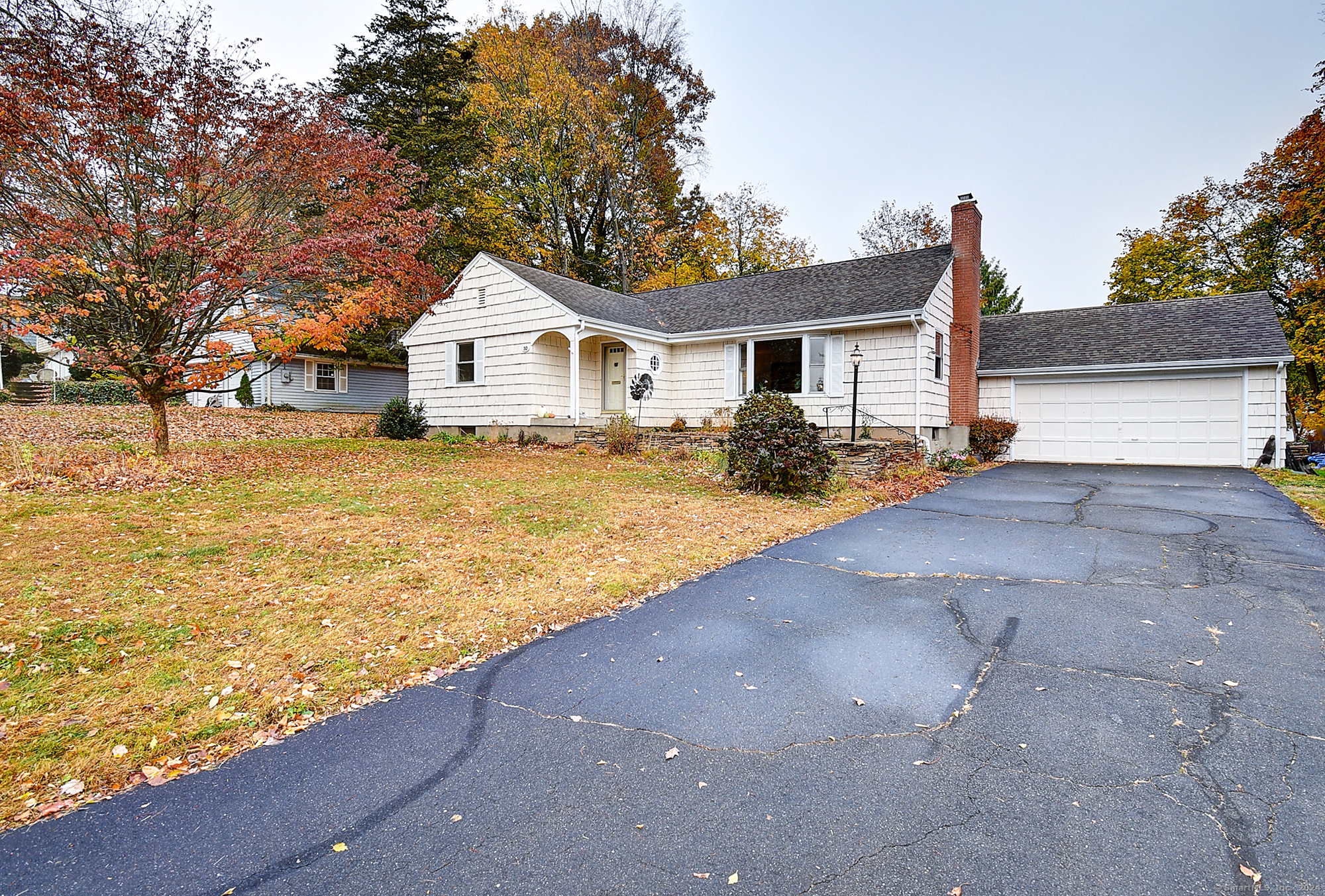 New to the West Hartford market, this beautifully remodeled three bedroom ranch has it all - location, square footage and charm! With over 1, 900 square feet of living space, hardwood floors throughout (refinished in 2023 and still looking brand new), new windows (2023 & 2024), a new hot water heater (Dec 2022), two completely remodeled bathrooms (including an ensuite), a new five burner gas stove, new LED lighting throughout, five new ceiling fans, new paint throughout (including basement and outside), a new stone wall installation in the front yard and an oversized basement, with high ceilings, primed for finishing and future enjoyment - 10 Rockwell Place literally has it all. The possibilities are endless. On top of all of the meticulous upgrades, the location is second to none. Located on a lovely cul-de-sac in a much sought-after area of West Hartford, you will be minutes from Blue Back Square and The Center with an array of restaurants, shopping and entertainment at your fingertips. Want to reconnect with nature? You're just a quick walk to Fern Park or one of the many local walking and biking trails. Need to branch out to neighboring towns? You have convenient access to Bloomfield, Avon, Simsbury and the rest of the Farmington Valley. There is literally nothing left to do but move in and enjoy all West Hartford and this beautiful home has to offer. Do NOT miss this opportunity and schedule your private showing TODAY!