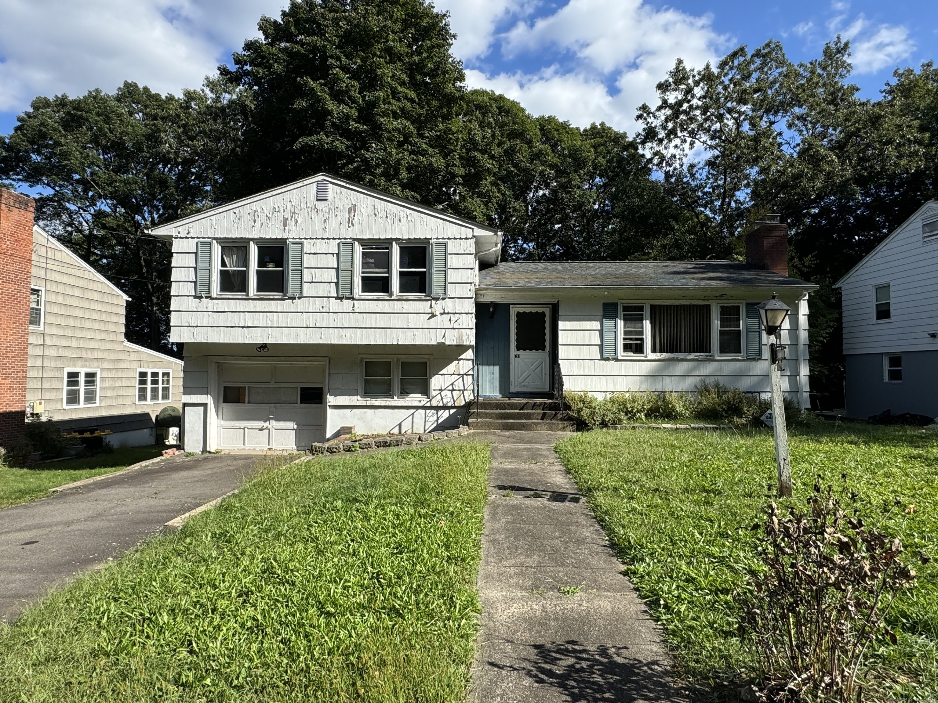 ***HIGHEST AND BEST DUE MONDAY 11/18 12pm*** GREAT INVESTMENT OPPORTUNITY!!! Attention all investors & handymen looking to unlock the benefits this split level home has to offer! The main level features a large living room with wood fireplace, and a large dining room area. The large kitchen includes an additional area for work space. The second floor features 3 bedrooms, and a full bath with tub and stand up shower. The lower level has additional living space such as a den/family room, with a half bath, and exit to the private back yard. The lower basement level has additional possibilities. Home also has a 1 car attached garage for parking. Home experienced an electrical fire in the lower basement. Being sold, AS-IS condition. The possibilities are endless, put your creativity to work! Quiet neighborhood, great location, and a quick ride to downtown New Haven. Must sign HOLD HARMLESS before appointment is confirmed. CASH or HARD MONEY only.