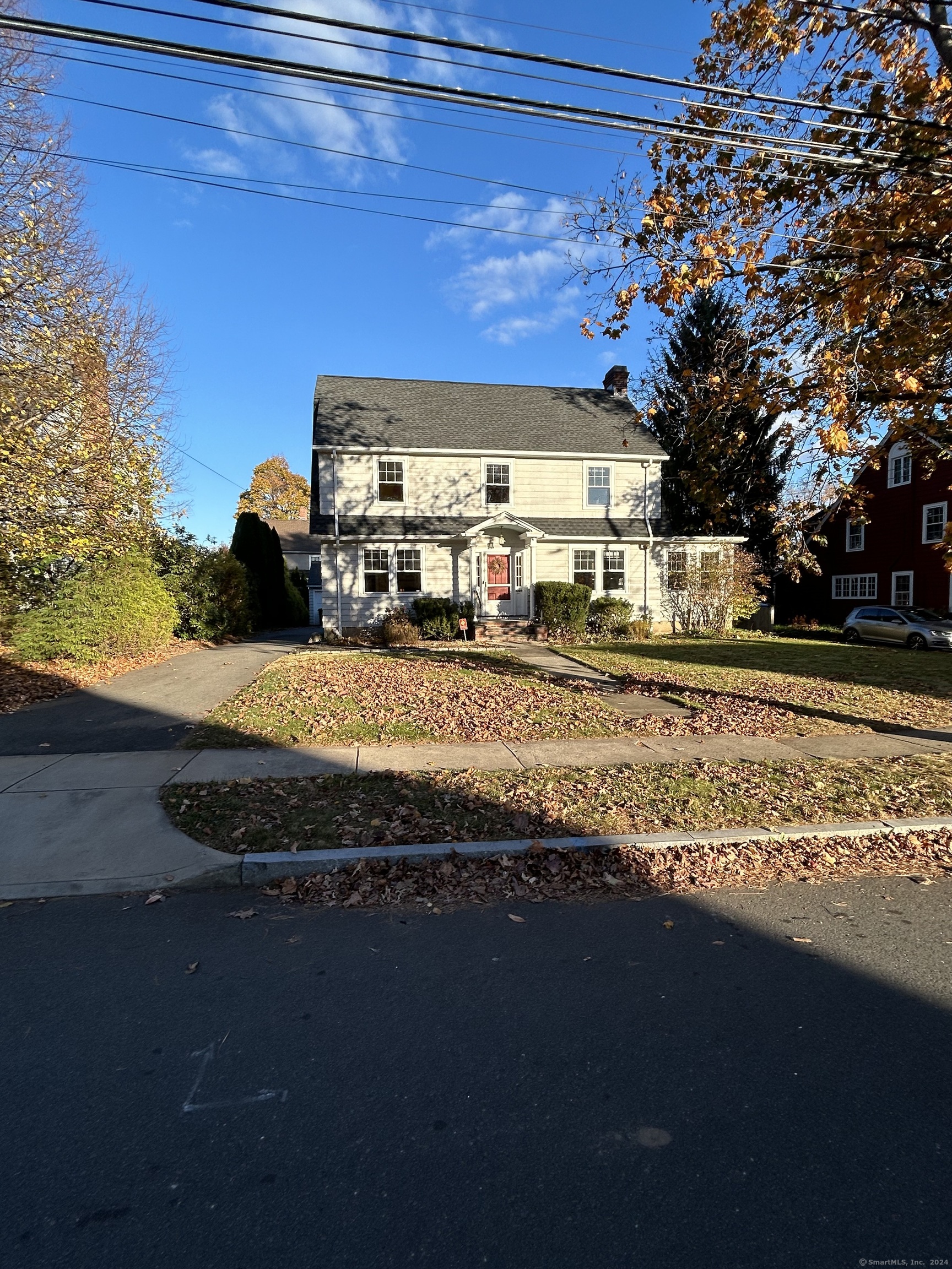 Welcome to where classic, charm and character come together and meet you on Lexington Road! This center hall colonial offers 4BR, 2.1 bathrooms and provides over 2200SF of living space. The front entryway is warm and welcoming. As you work your way through the first floor you are embraced by an inviting dining room with a built-in hutch and front yard views of the neighborhood. Off the dining room is a charming butler's pantry that flows into the eat-in kitchen, which overlooks the well situated backyard. Swing past the hallway powder room on your way to the large front-to-back living room with a fireplace and great natural light throughout. There is also an office/flex room off the large living room. The second floor hosts 3BRs and a full bathroom. The large primary bedroom has two closets. On the 3rd floor is a 4th bedroom, as well as another full bath and walk in storage room. This home has character throughout with hardwood floors, built-ins, arched thresholds, and French doors. Additional features include newer roof (2017), as well as a brand new furnace, refrigerator, and dishwasher, as well as a 2-car detached garage and plenty of storage options. This house, this street, this town......conveniences abound. Please do not wait to schedule your showing!