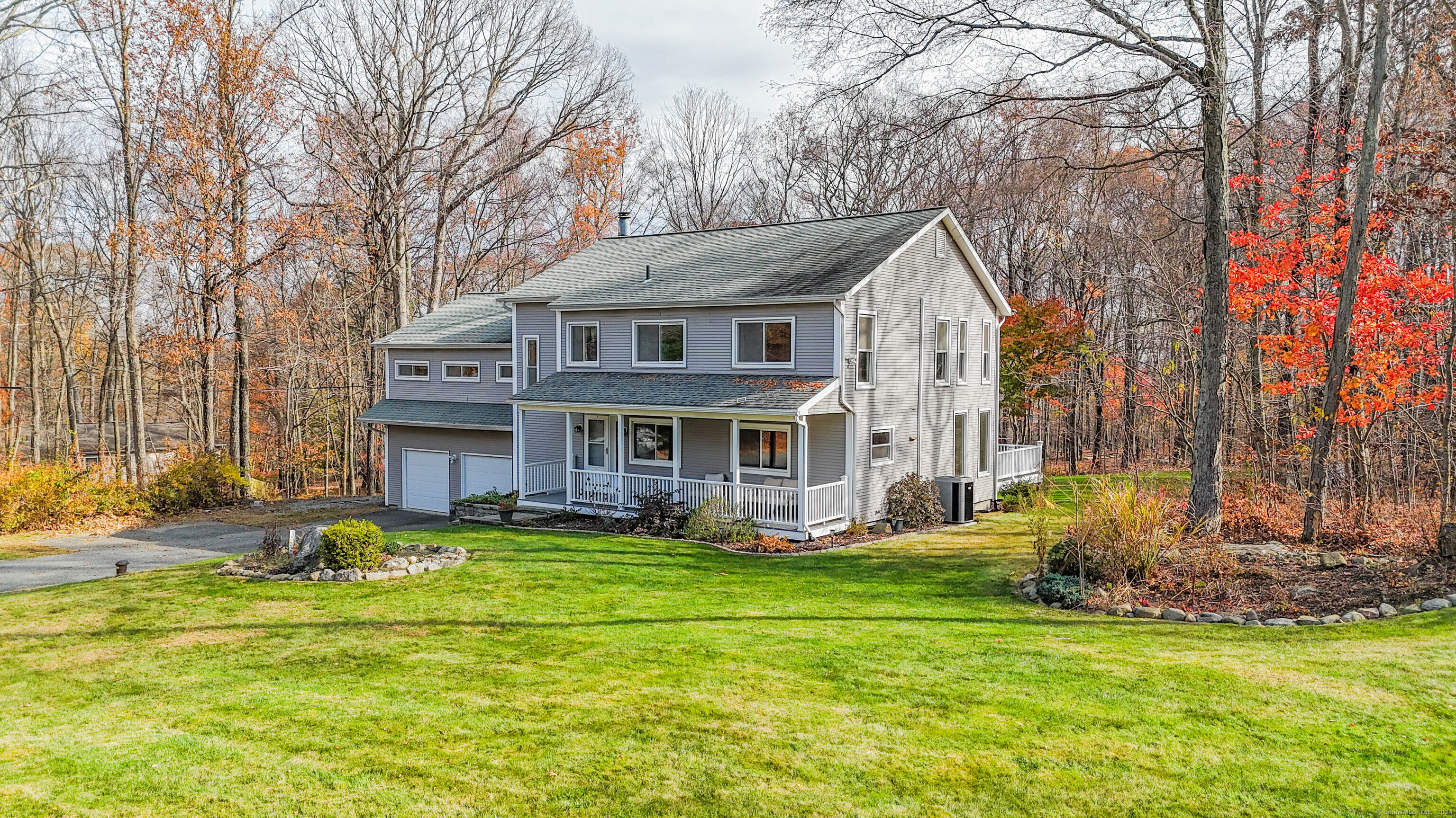 Welcome to 7 Farmwood Drive, a stunning residence nestled in the heart of Prospect, CT, offering both privacy and expansive living spaces. Set on a beautifully level lot, this home provides a perfect blend of functionality and space and is ideal for those who desire room to spread out both indoors and out. Upon entering, you'll be greeted by a spacious layout that flows effortlessly from room to room, creating an inviting atmosphere for everyday living and entertaining alike. The main level features a fantastic guest suite, complete with a private bath-perfect for visitors, in-laws, or even as a home office with its own space. Upstairs, the large primary suite awaits, complete with an impressive walk-in closet that will exceed all your storage needs. The convenience of having the laundry room on the upper level makes everyday chores easier, giving you more time to enjoy this beautiful home. Outside, the serene, level lot provides for privacy and a blank canvas for your outdoor vision-imagine a backyard oasis, garden space, or a play area. Embrace the tranquility and spaciousness that this property provides and make it your own retreat.