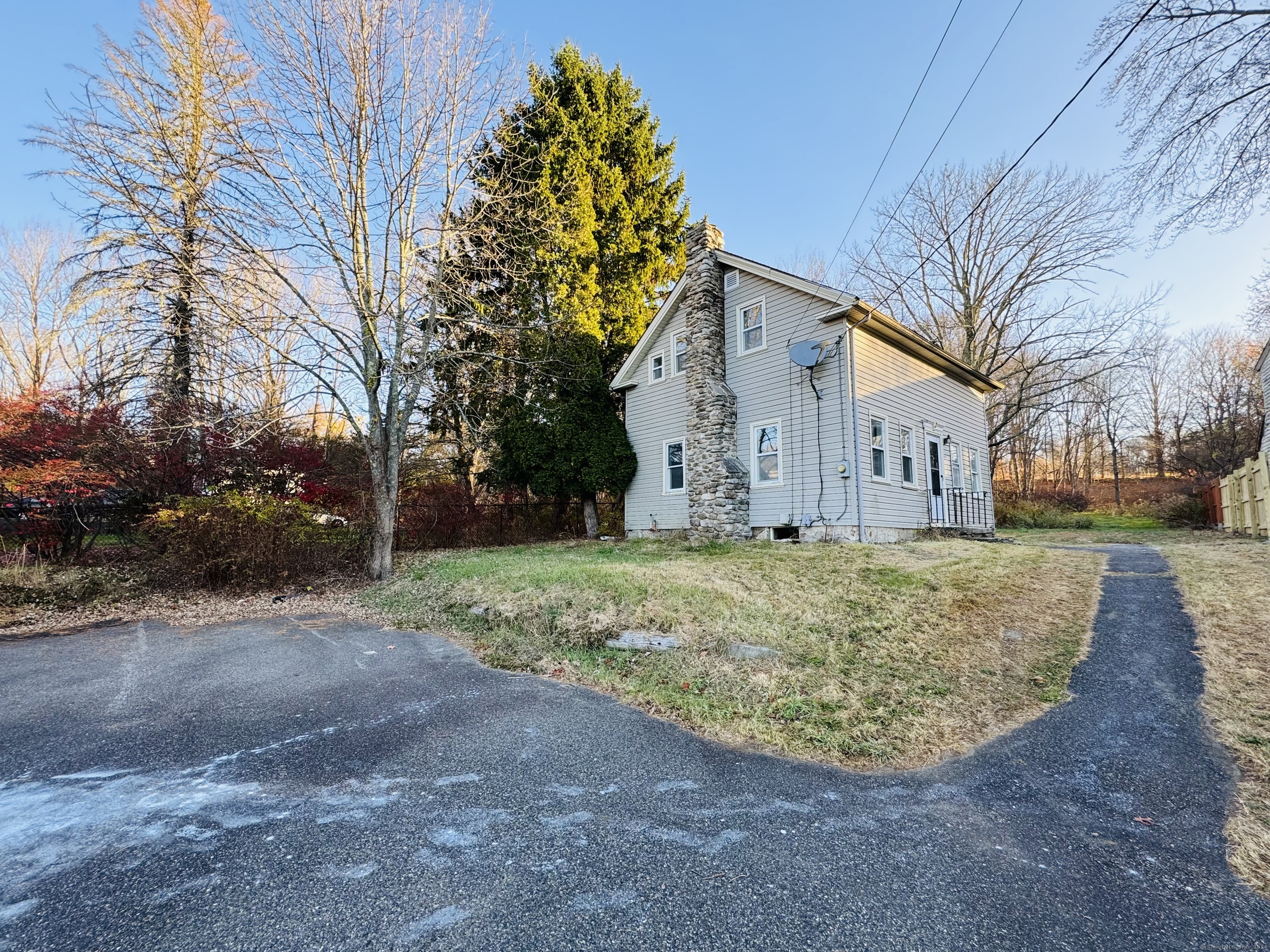 ADORABLE 2-bedroom home on almost an acre has CITY SEWER and is right on the RI line! FRESHLY PAINTED, BRAND NEW white shaker cabinets, countertops, sink light fixtures. NEW flooring throughout with dining area and large living room. BRAND NEW CARPET on stairs and bedrooms. 1 bathroom on first floor w/ shower and 1 on upper level w/ soaking tub. 1 st floor laundry hookups for convenience. ***property to the right was just purchased***