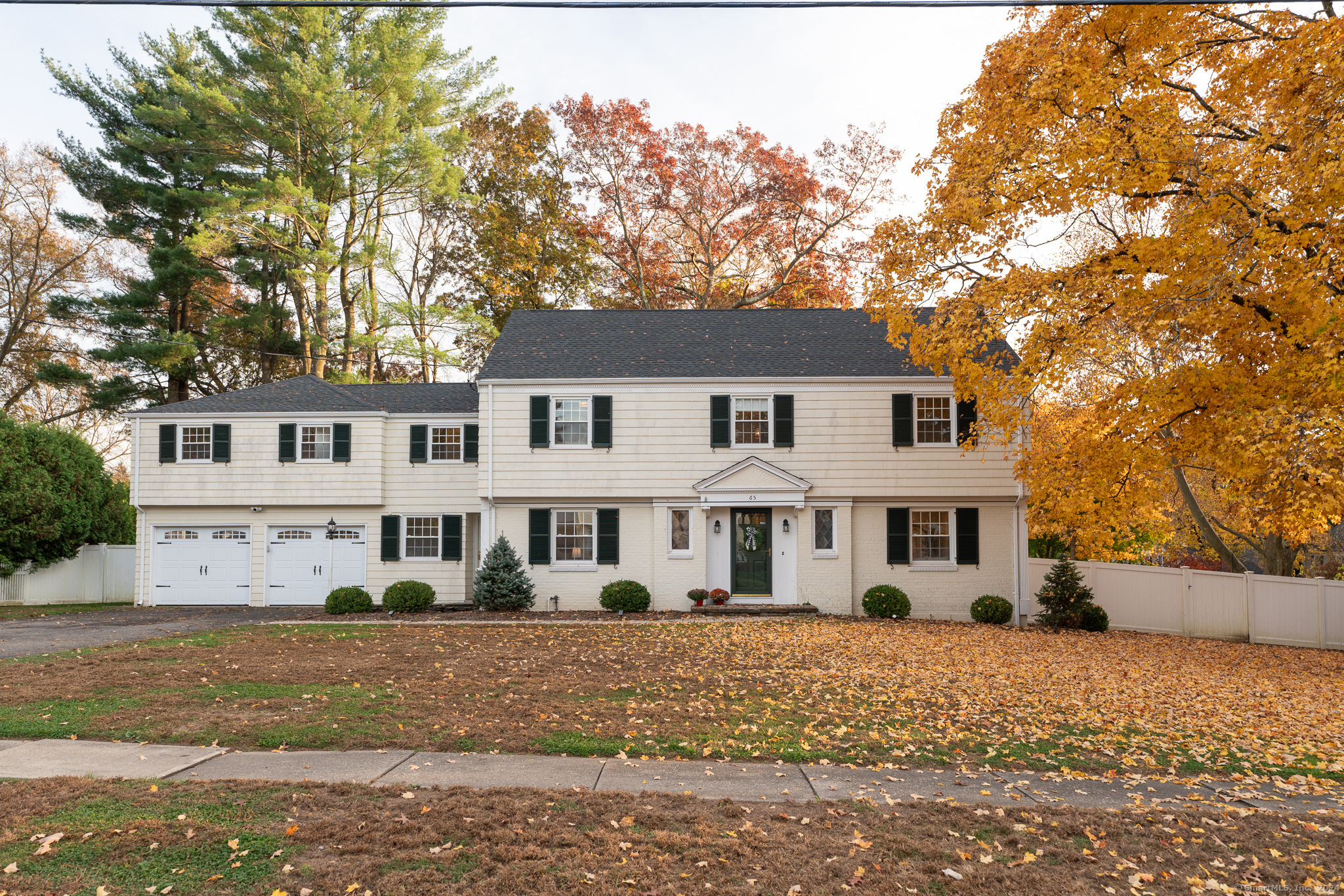 Welcome to this fabulous and elegant Colonial home, located in the highly sought-after Bugbee School District. Offering an abundance of space and beautifully updated throughout, this home combines classic charm with modern convenience. The main level features a spacious front-to-back living room, with a wood burning fireplace, and gleaming hardwood floors that carry throughout the home. Off of the living room is a lovely screened-in porch. The formal dining room is large with plenty of furniture placement options, and it has classic built-ins, perfect for family gatherings and entertaining. The updated, eat-in kitchen is a chef's dream, showcasing a gigantic island, quartz countertops, new appliances, and ample seating and storage. There is also a lovely and very functional mudroom off of the kitchen. The second floor boasts 6 generously sized bedrooms and 3 full baths, one very recently updated. One of the 6 bedrooms is the luxurious master suite with its own private bath. In addition, there's a potential in-law suite above the garage, complete with a separate staircase and 2 bedrooms. Convenient, second-floor laundry completes the upper level of this home. The finished basement offers additional living space, ideal for a playroom. Outside, enjoy the expansive, flat, fully fenced-in backyard with a bluestone patio - a perfect spot for outdoor relaxation. This home also offers newer windows, Central Air, and an attached 2-car garage. Don't miss out on this incredible home!