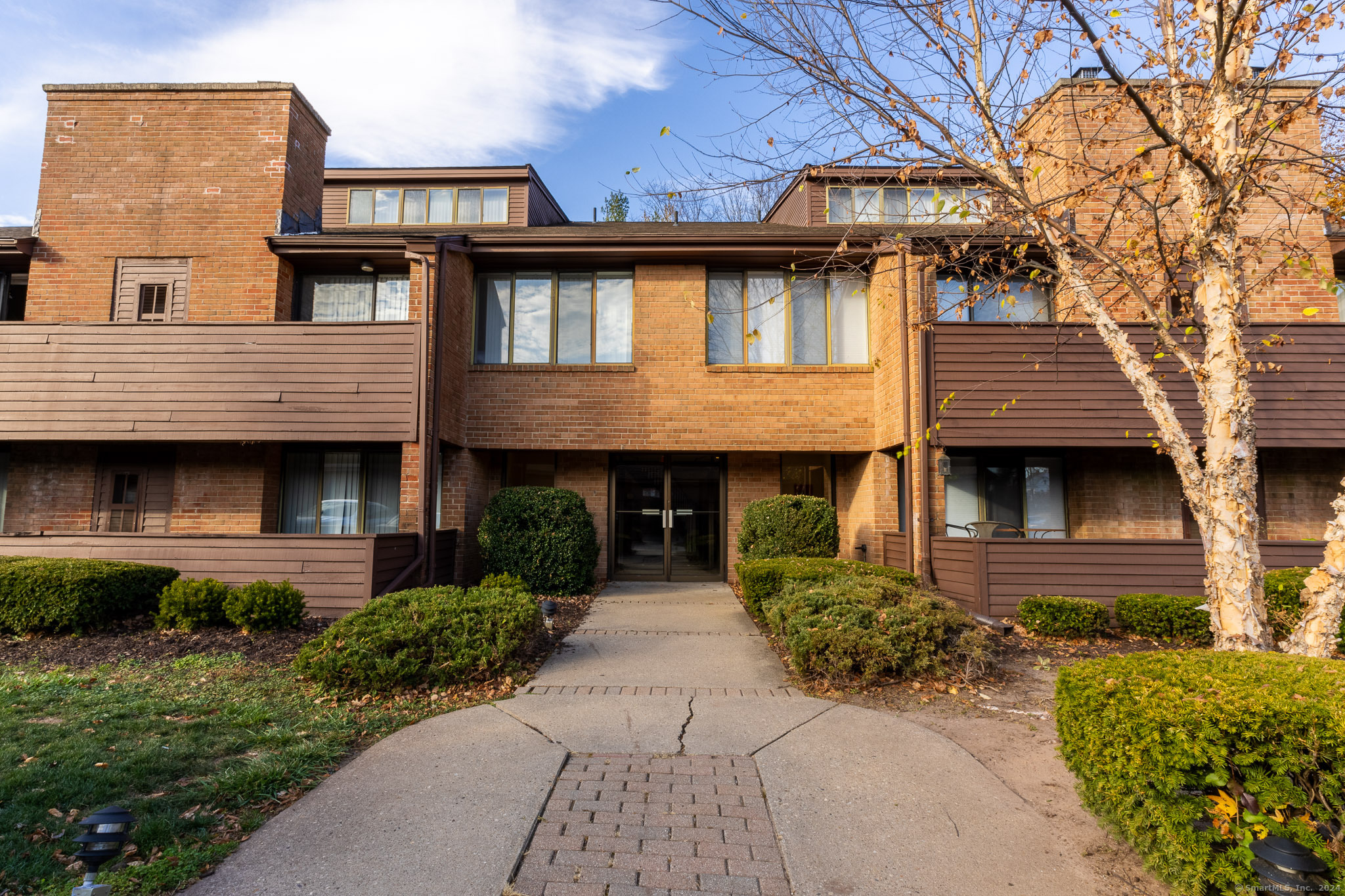 Welcome to 25 Stanley St, Unit #B1 in West Hartford! This spacious 2-bedroom, 2-bathroom unit offers an open dining and living area, generously sized bedrooms, and the added convenience of in-unit laundry. Located in the most desirable location in all of West Hartford. Just THREE short blocks to the heart of South Main and Blue Back Square, you will have quick and easy access to all of the city's best offerings - restaurants and cafes galore, boutique shopping, upscale markets, and more. All of this without sacrificing the peace and quiet of a tree-lined residential neighborhood! Lead your furry friend around the neighborhood of historic single-family homes or enjoy the amenities at Fernridge Park & Pool just two blocks north. Accessible to major highways. 1 uncovered parking space included. 24-hr maintenance. Garage fee $100/month.