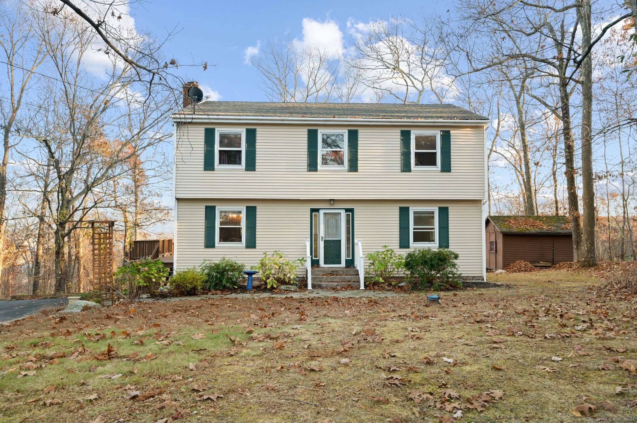 Nestled at the end of a peaceful cul-de-sac, this stunning 4-bedroom Colonial home offers ultimate privacy and breathtaking views of the Connecticut River. When you arrive, the spralling multi-level deck will welcome you and be the perfect setting for get-togethers and barbecues. Step inside to find spacious, light-filled rooms with large windows, a combination kitchen/dining room with gorgeous river views and plenty of room for entertaining. Upstairs, you will find 4 well-sized bedrooms and a full bathroom. In addition to that, the basement offers an office with large closet and a recroom with walk-out doors. Once outside, enjoy a private backyard retreat with lush greenery, ideal for relaxation and gatherings. This property combines the tranquility of nature with the convenience of nearby amenities, making it a rare find for those seeking a serene yet accessible lifestyle. .30 acre lot known as Old Cart Rd inlcuded in the sale