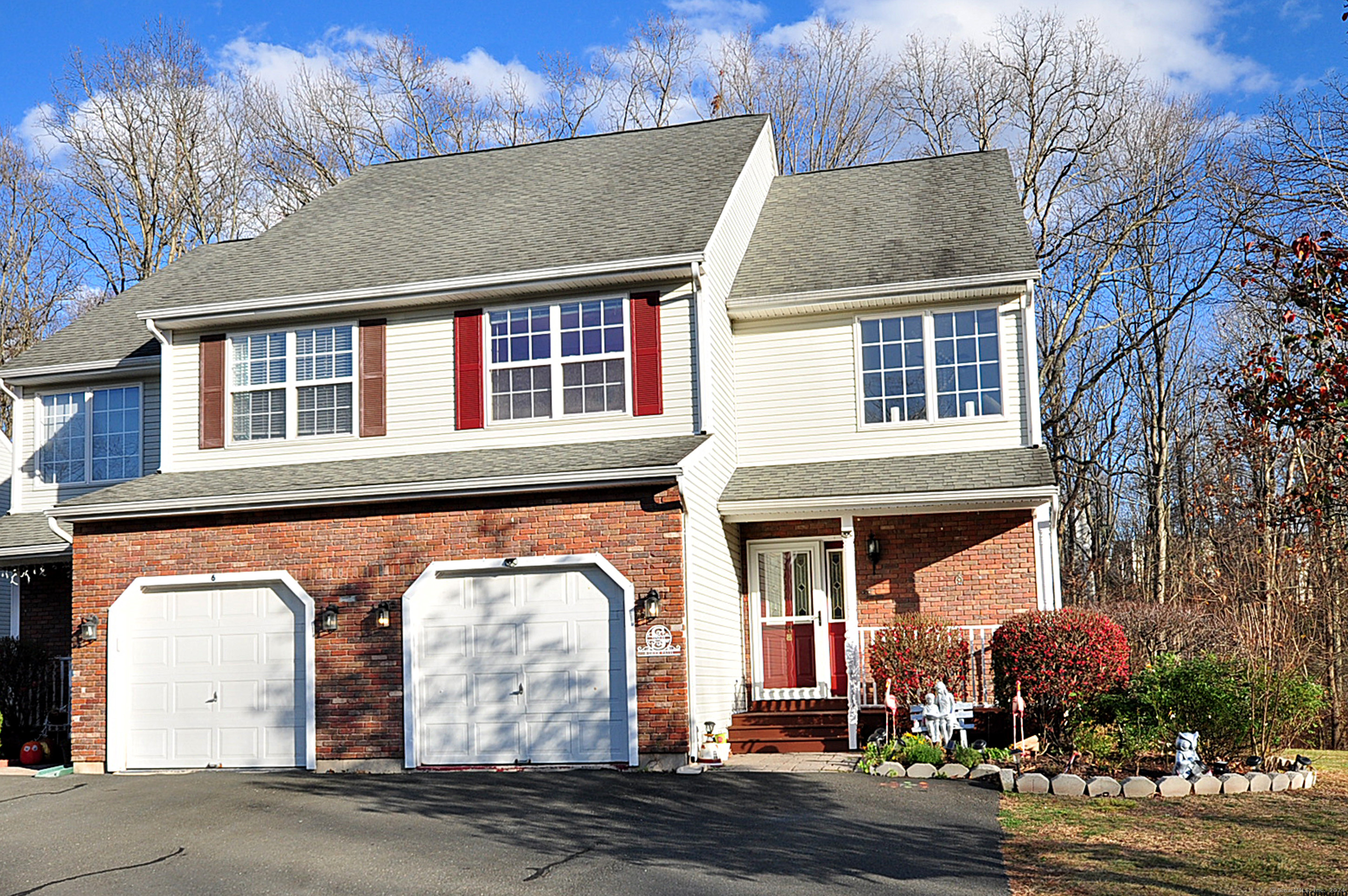 Beautiful 2 bedroom, 2 full and two 1/2 baths END UNIT townhouse located in a quiet cul-de-sac of Highridge Estates in Rocky Hill. This newer 2006 built unit has been meticulously maintained with hardwood throughout the main living areas! Featuring a spacious open floor plan, the living room has high ceilings and a gas fireplace with sliding doors that lead to your own private walkout deck with views of the woods. Kitchen equipped with new stainless steel appliances including a gas stove, Laundry, tile flooring and a breakfast bar. The second floor features a spacious master bedroom with full bath and large walk-in closet; along with a separate LOFT, perfect for an office or play area. An additional bedroom with a walk-in closet and full bath are located on the 2nd floor. New carpet on 2nd floor. Enjoy the FINISHED basement with pre-hooked wiring for Home theatre/Projector and sound systems, perfect for entertaining. Basement also has an additional half bath for convenience and plenty of storage area and shelves throughout. Additional features include updated modern light fittings with chandeliers, a 1 car garage (with Smart garage door opener with video recording capabilities), Pre-hooked Home Security and alarm system, central air and natural gas heat. This home has a lot of private outdoor space with multiple guest parking and is located near major highways and shopping areas. LOW HOA FEE and NO SPECIAL ASSESSMENTS.