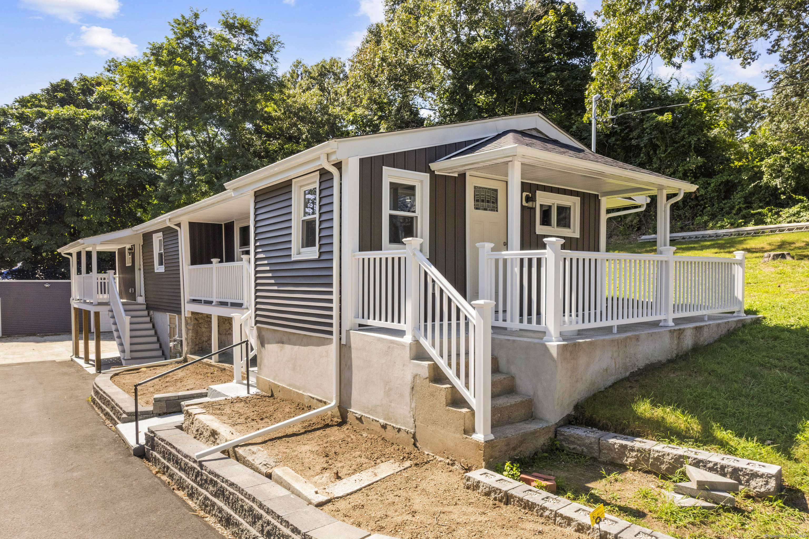 Unit #2 is a 2 Bedroom 1 Bathroom Ranch style Home. This rental is for the ENITRE HOUSE. The house was rebuilt from the foundation up. Everything in this property is brand new. Hardwood floors throughout, new appliances, new paint job, new plumbing, new roof, new siding, new windows, and off street parking! There are washer dryer hookups in the basement of this Ranch Style Home.