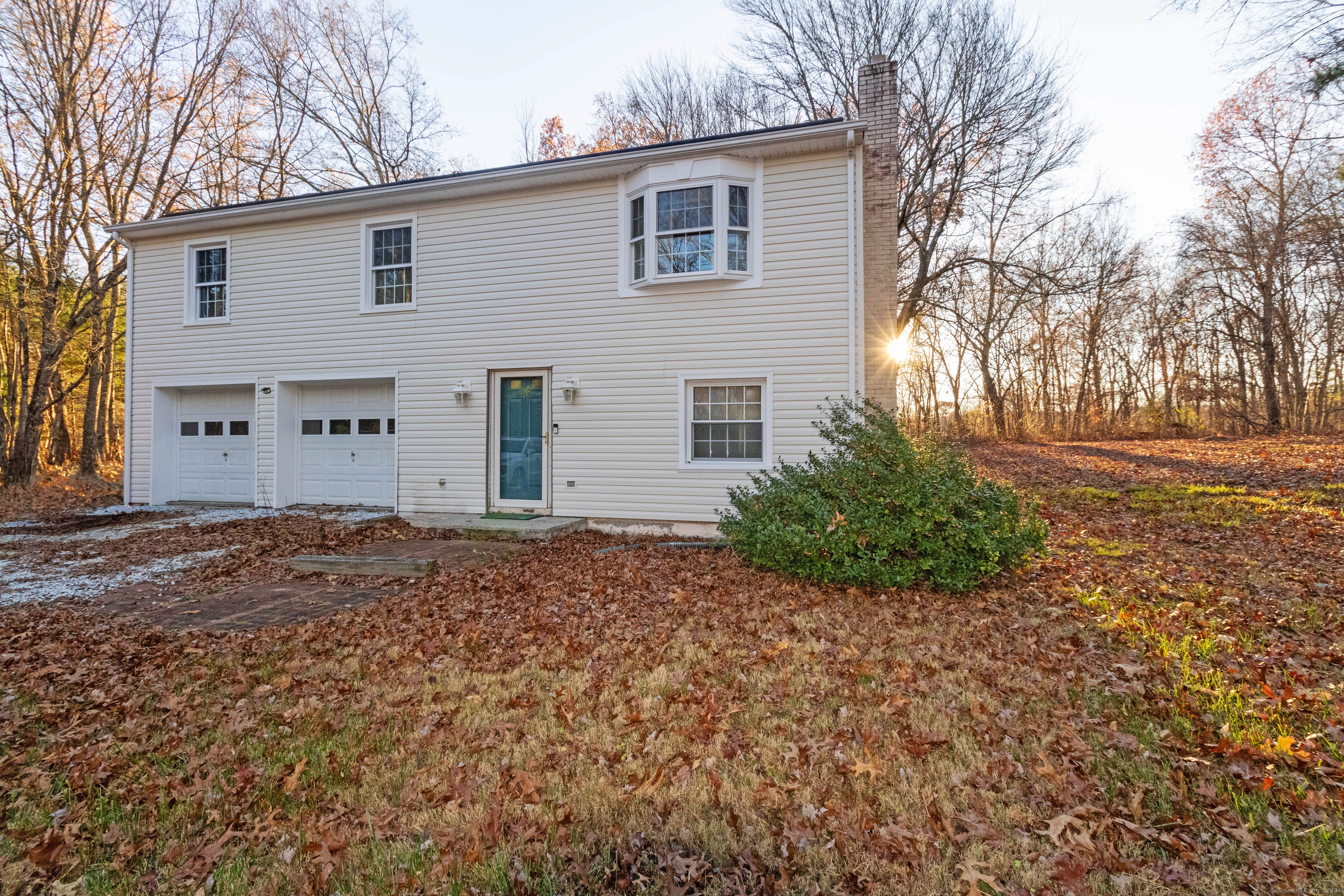 Don't miss the opportunity to own this 3-bedroom home on 1.6 private acres of land with beautiful pond views from the back yard! As you pull in, you'll notice the spacious two-car garage that leads into the bright, walk-out basement space, which can be refinished or used for extra storage. This is also where you'll find the laundry hookup and half-bathroom. The upstairs has the convenience of one level living, with the kitchen/dining, living, full bath and 3 bedrooms all on this main floor. Many upgrades have been done including new windows in 2015, stainless steel kitchen appliances, and hardwood flooring in the living room. Solar panels were installed in 2018 to save on energy costs. A brand new deck was built with back slider door in 2018 to enjoy the peaceful outdoor space, which even includes a large shed. With some cosmetic updates and fixes, you can build equity and turn this property into your next dream home!