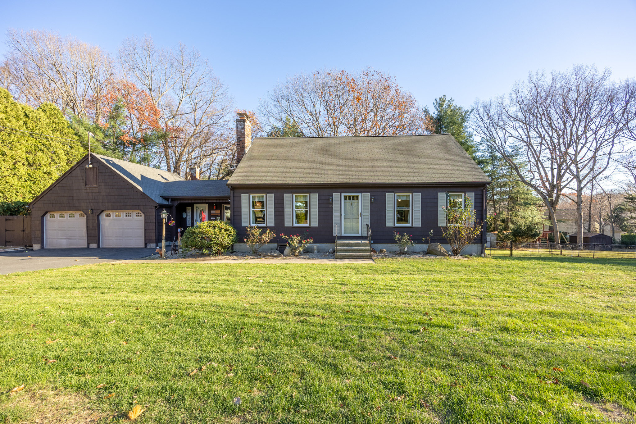 Charming Cape-Style Home with Open Floor Plan! This beautifully updated Cape-style home offers a perfect blend of modern amenities and cozy charm. Inside, the spacious open floor plan features a renovated kitchen with a center island, perfect for meal prep and entertaining. The adjacent dining area boasts a cozy propane fireplace, creating a warm and inviting atmosphere. Gorgeous hardwood floors flow throughout the main living spaces, including the living room, adding timeless appeal. On the first floor, you'll also find a convenient den with a pellet stove, offering additional space for relaxation or work, as well as a full bath. A slider from the den leads out to the deck, ideal for outdoor dining or enjoying your private backyard. Upstairs, the second floor features 3 spacious bedrooms and a full bath. The lower level has been finished to offer even more living space, complete with a pellet stove and another slider leading to the patio - perfect for relaxing and entertaining. The large, fenced-in yard is a standout feature, with plenty of space for recreation and privacy. You'll also enjoy the hot tub, above-ground pool, and an irrigation sprinkler system to keep your lawn lush. Recent updates include new windows throughout the home, providing enhanced energy efficiency. Additional highlights include a two-car garage for convenience and storage. Don't miss the opportunity to see this wonderful home! Schedule your showing today!