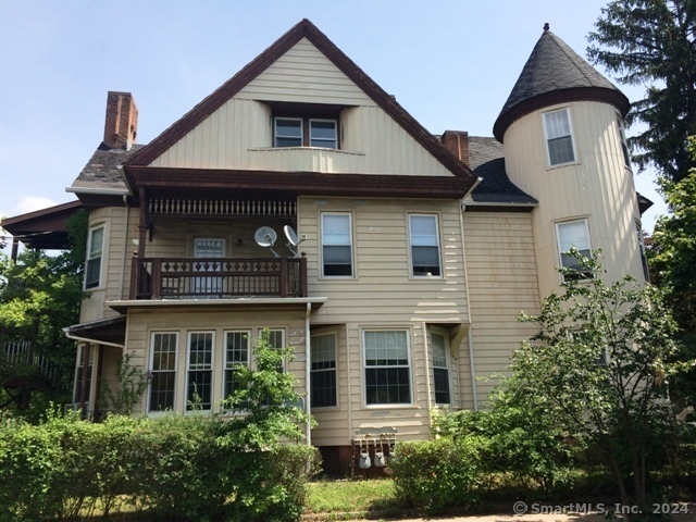 An ideal opportunity for Owner Occupied or Investor......'Prime' East Rock location.... **1st floor: 2 bed/ 1 bath, 'over' 1, 800 square feet, **2nd floor: 2 bed/ 1 bath, 'over' 1, 800 square feet, **3rd floor 2 bed/ 1 bath, 1, 035 square feet...... Large 3 family with almost 5, 000 square feet of living space....gas heat & hot water Amazing location steps to gourmet markets, the Yale Campus....Proximity to the Yale Shuttle, just minutes to Downtown New Haven. ......Beautiful parquet floors, newer Roof ( 2 years old), 2 fireplaces, french doors....coin op laundry in the basement...........The building is sited on a fantastic corner lot with a driveway with tandem parking for two cars & a 2 car garage..... Both on and off street parking and a decent sized private back yard area. ..... New Haven's new of-right ADU ordinance *should* allow another tenant unit of-right on lower level, so long as main unit is owner-occupied. *Buyers to verify details.