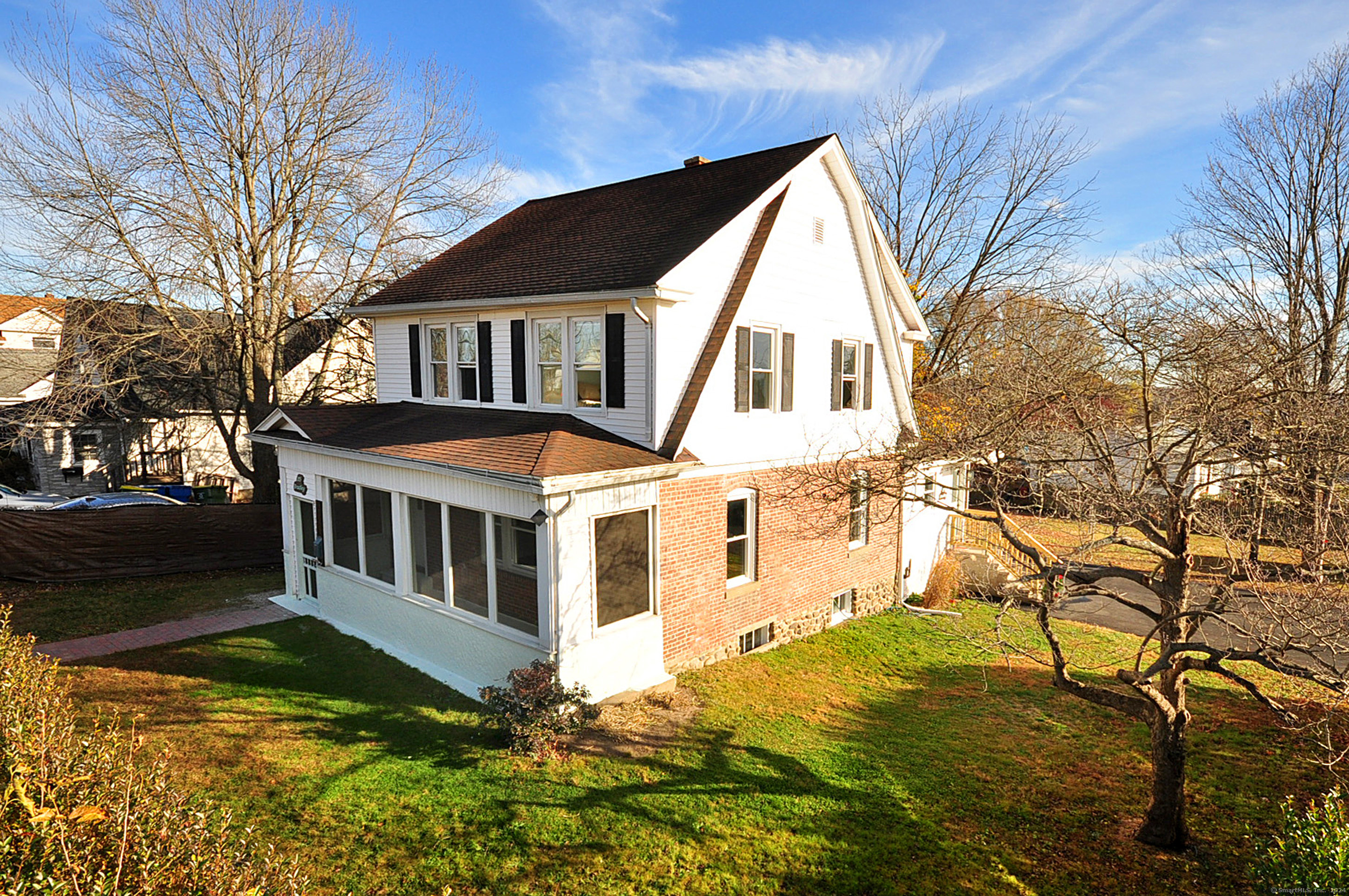 Welcome to your completely remodeled dream home in the desirable Town Plot neighborhood.  This beautiful updated 3 bedroom, 2 bathroom colonial home effortlessly blends the charm of yesteryears with the modern conveniences of today. This home features carefully curated updates to make you feel right at home.  The home boasts a well-maintained exterior, including a classic screened-in porch perfect for sipping coffee or enjoying quiet mornings.  Step inside to find gleaming hardwood floors throughout, fresh paint, 9ft+ ceilings, and a spacious layout filled with natural light.  Recently updated kitchen features sleek countertops, new cabinetry, stainless steel appliances, and a stylish backsplash, making it the perfect space for cooking and entertaining.  Both bathrooms have been completely remodeled with modern fixtures, stunning tile work, and chic finishes.  Each of the three bedrooms has ample space, natural light, and classic details, creating comfortable retreats for rest and relaxation.  The open living and dining rooms are ideal for family gatherings or quiet evenings.  The backyard is a serene space with mature trees, perfect for outdoor dining or relaxing after a long day.  2 car garage, newly paved driveway, City water, city sewers, new oil tank, hot water heater, newer furnace and roof mean there is nothing left for you to do except move right in.  Close to schools, shopping, dining and wonderful commuter location.