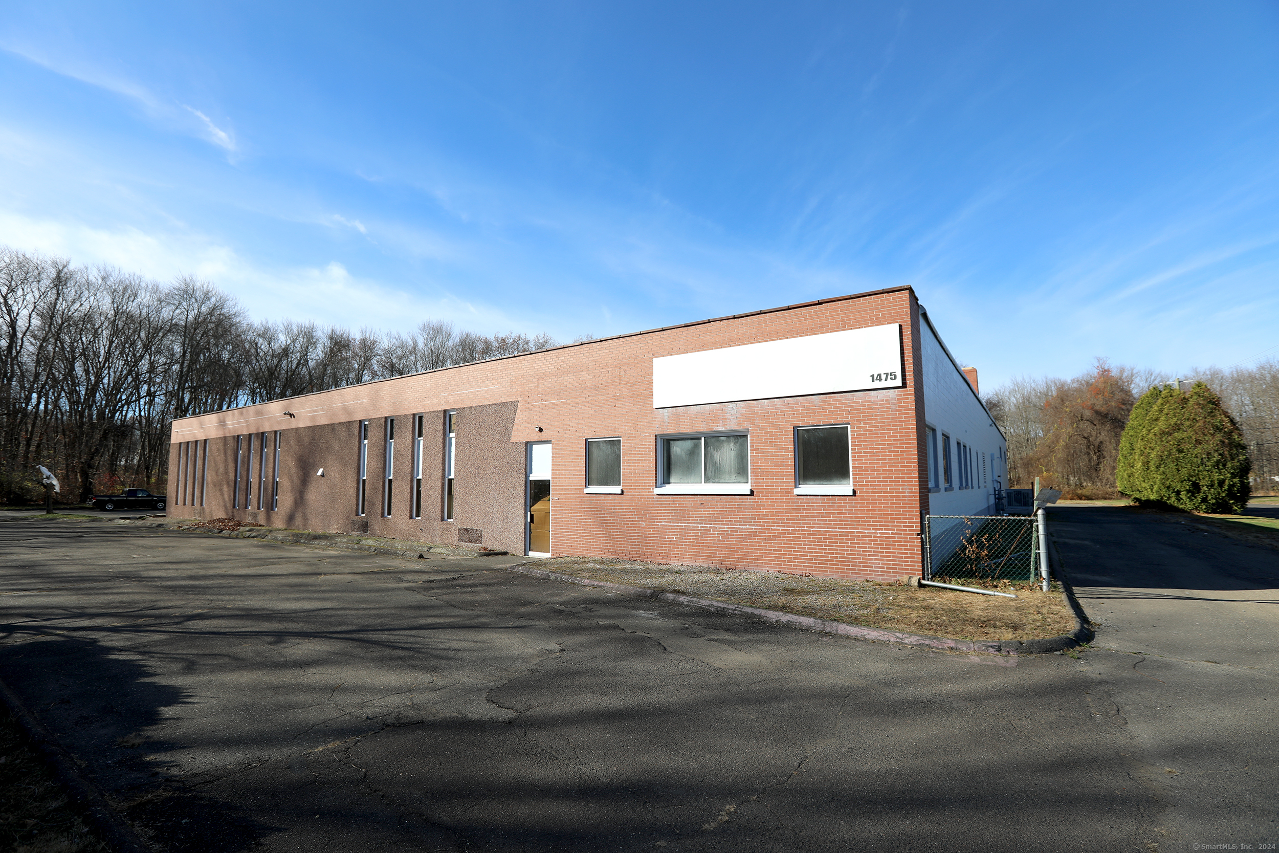 Prime commercial opportunity on Palisado Ave in Windsor, CT! With over a total of 22, 000 sf, this versatile property features 7, 000 SF of refrigeration space and 6, 000 SF of newly updated office space, perfectly suited for a variety of businesses. Situated on 4 acres of buildable land, the property offers ample room for expansion or additional development. Its convenient location to Interstate 91 and the airport ensures excellent accessibility. Property is zoned warehouse, allowing additional building of up to 4 stories on property. Great for self storage, logistics, or wholesaling. Brand new septic Summer of 2022. To be delivered vacant.