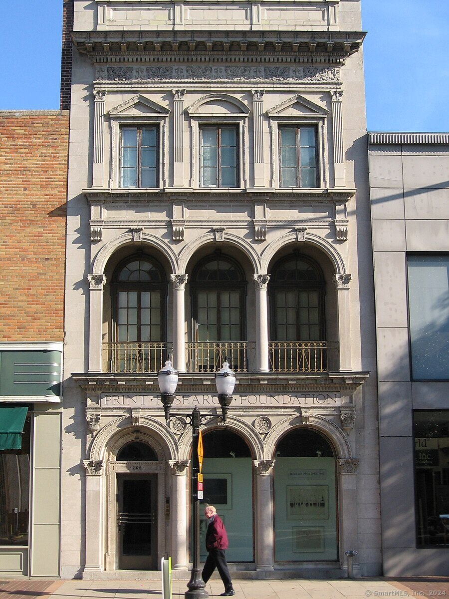 Situated in the heart of downtown Stamford sits an enormous opportunity to reimagine this historic 1835 building once known to many as the Stamford Advocate office. The exterior showcases a limestone facade with neo-Italian Renaissance design, impressive columns, Roman arches, pediments, corbels, carved scrolling and hand crafted bronzework. The current owner has eliminated the dated interior and obsolete finishes while preserving character details, period brick and worthwhile features. An approved building permit is in place from the City of Stamford to build out the space for single tenant use as a white box in preparation for its next occupant. Plans include a significant rooftop entertaining space, tremendous vertical opening which distributes light beautifully throughout the building, focal point central stairs, elevator and even renderings for potential special features like a coffee/nosh bar, partitioned office spaces, a board room, gymnasium and more. Key among the highlights are: sought after central downtown location, historic architecture, large open spaces, 36 parking spaces inside 300 Atlantic Street Garage with direct garage access into 258 Atlantic Street. A brief walk will bring visitors from the Stamford Metro Station, or step out and venture to a number of nearby restaurants, offices, hotels, historic buildings and so much more. Come see this amazing opportunity!