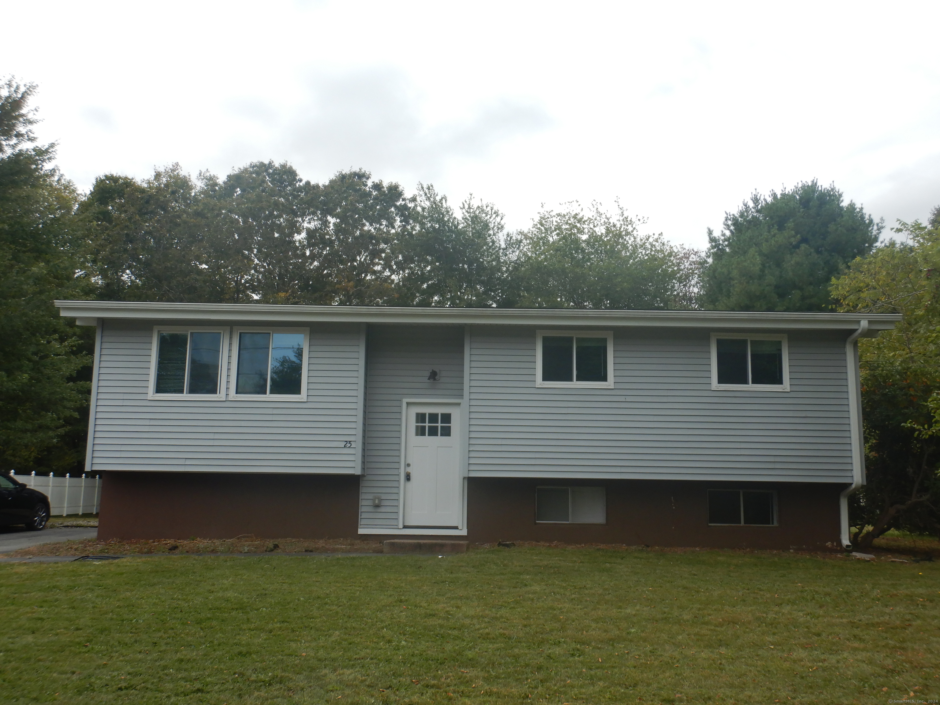 Remodeled Raised Ranch style home features an open layout. Living Room opens up to a fully applianced kitchen with breakfast bar and slider leading to an above ground deck. Freshly painted. New carpeting in hallway and bedrooms. Primary bedroom has a half bath. An additional 300 SF finished in the lower level. Newer mechanicals. Propane forced hot air heating system. Central Air. Property backyard abutts Model Park playground. Nothing to do here but move right in. See Agent to Agent remarks.