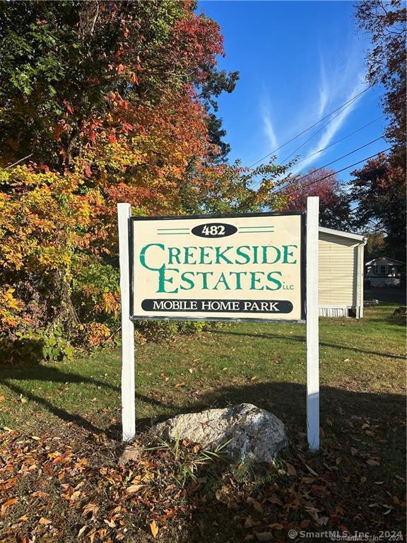 Creekside Mobile Home Park Complex is backed by mature trees and outlined by a babbling river that feeds into the Pequabuck River & the Coppermine Brook. This Mobile home has its own paved driveway for off street parking & guests, quaint yard space with shed, Front & back decks, open floor plan with newer floors throughout, kitchen that opens to the dining room & living room. 2 generous bedrooms, 2 full bath & laundry. This location is near Lake Compounce, Norton Park, Indian Rock Nature Preserve & Bristol Hospital with easy access to either Rt. 6, 72& 84!